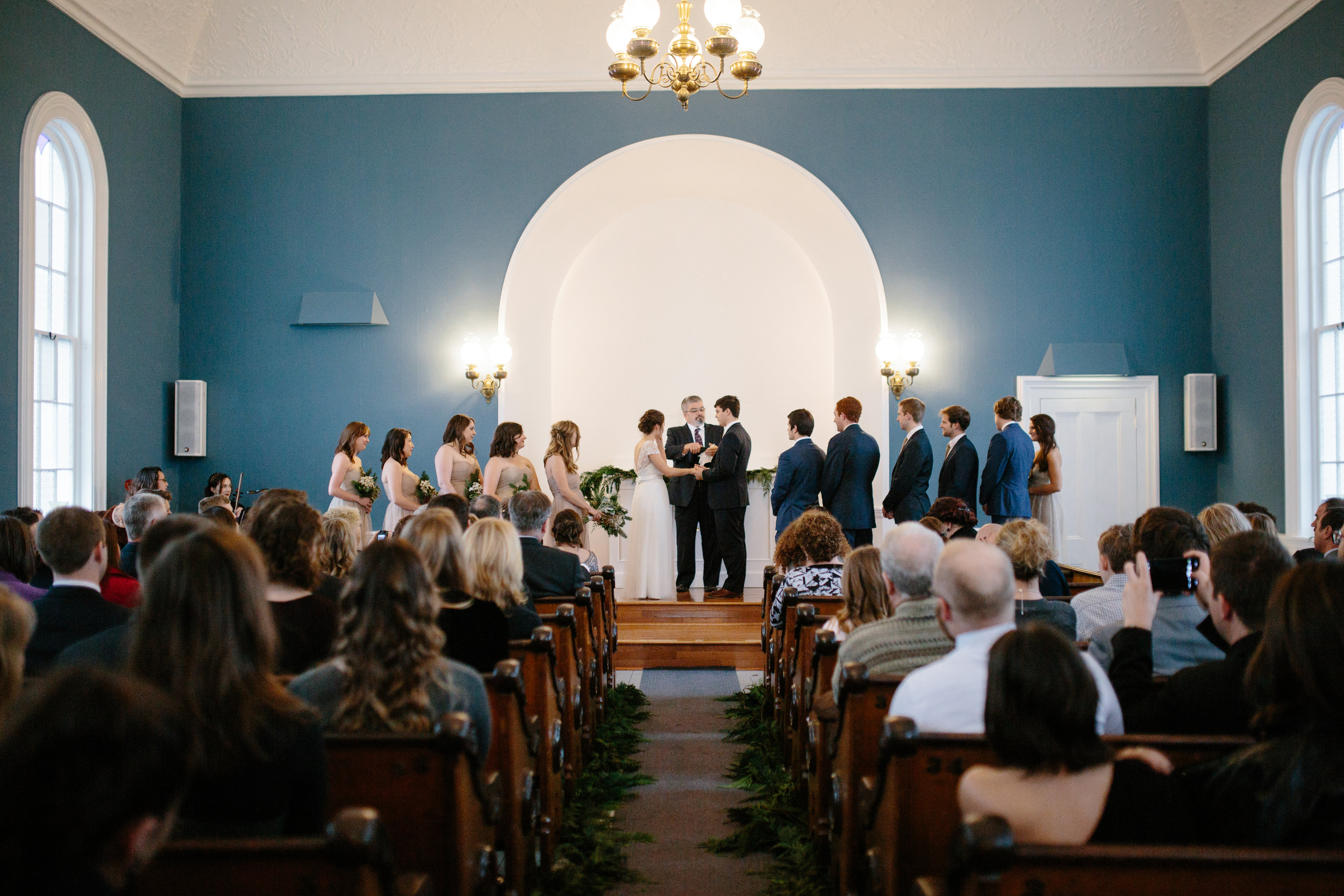 wedding ceremony in st. paul's church in port gamble, Washington