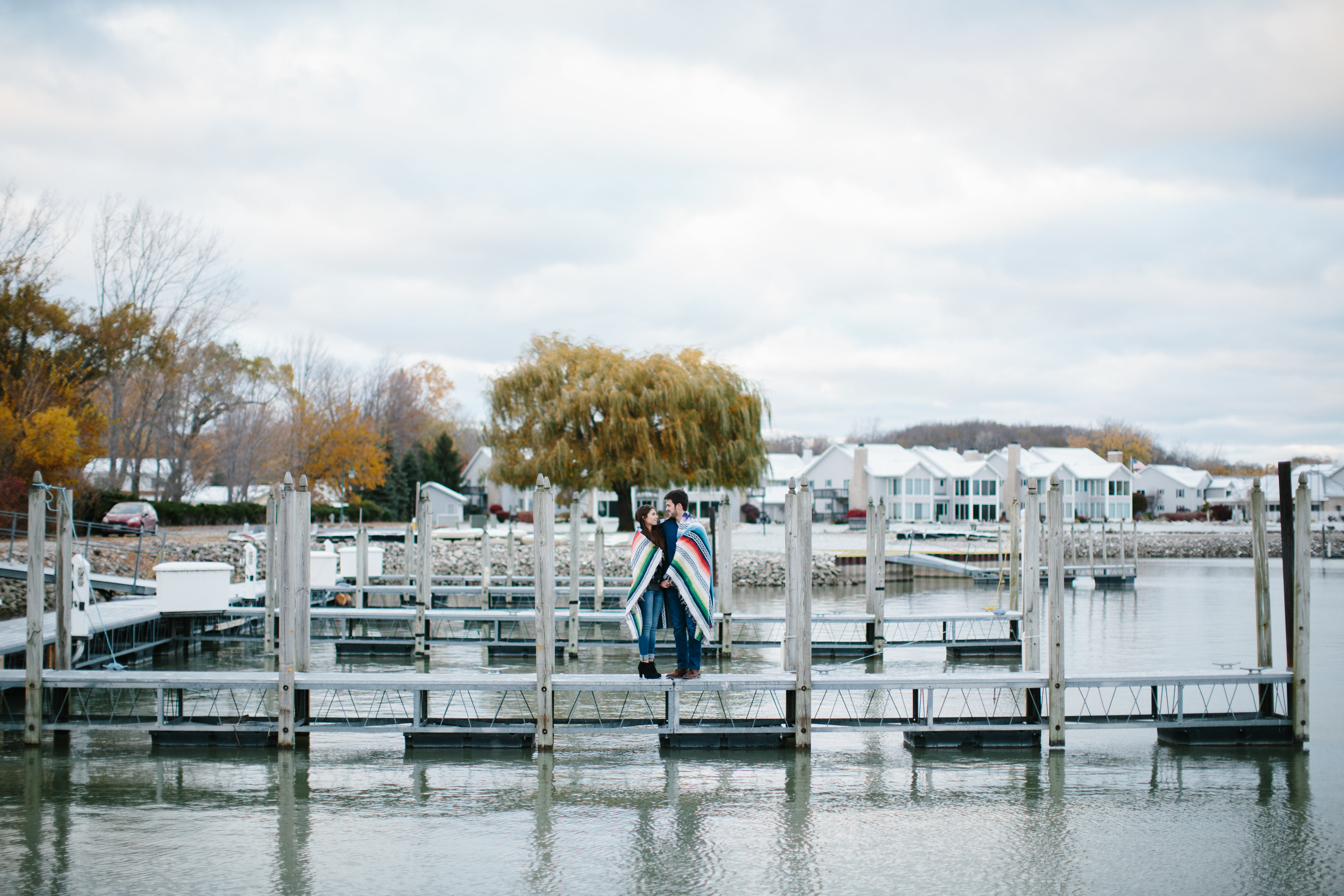 couple in blanket by lake erie