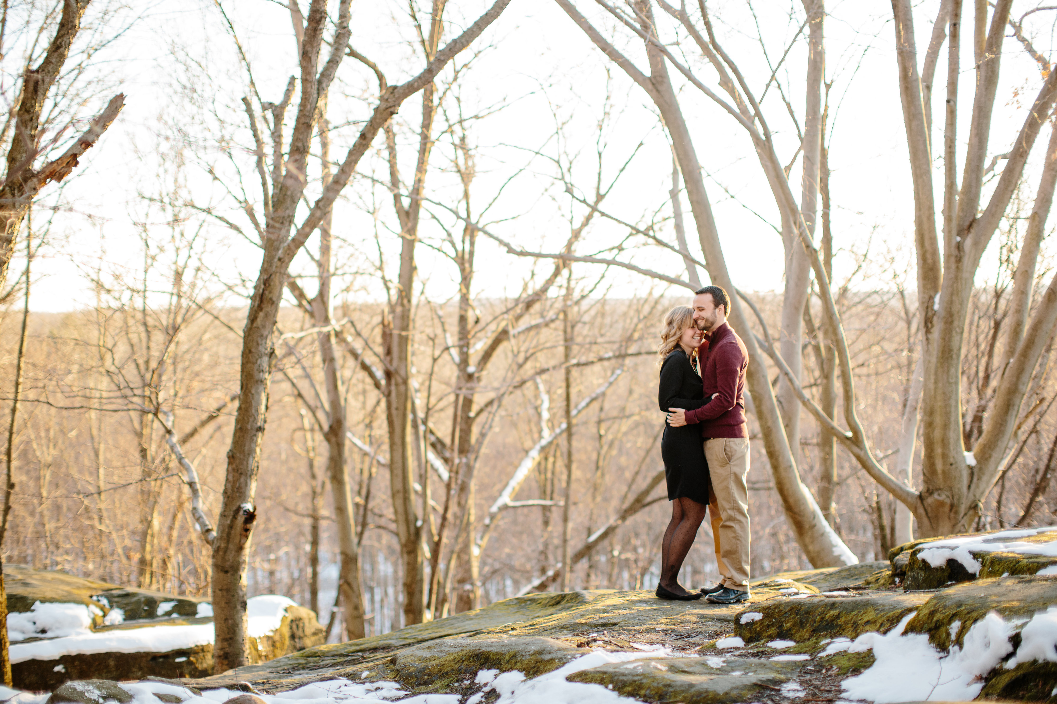 couple cuddling close during engagement session