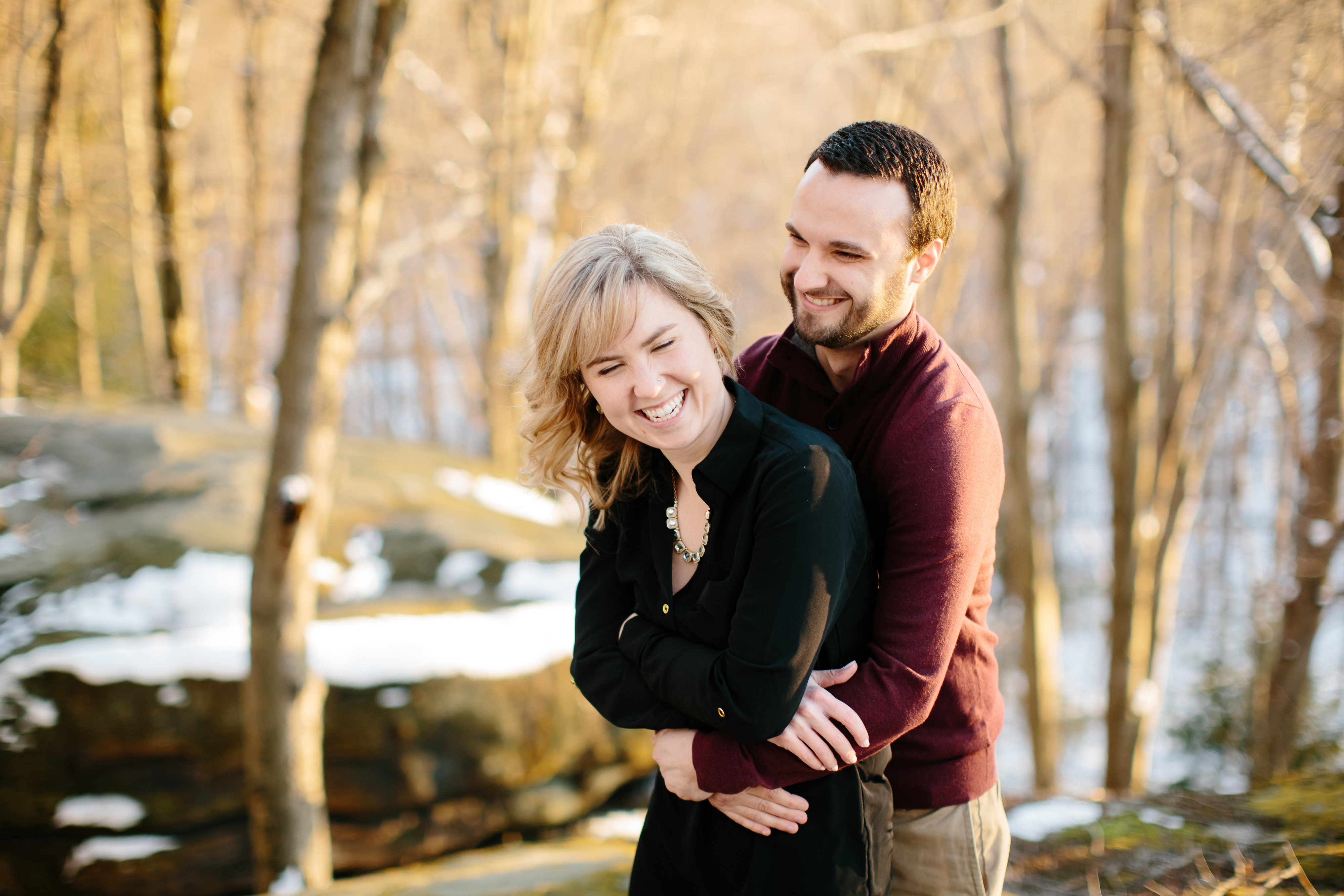 couple laughing during engagement session 