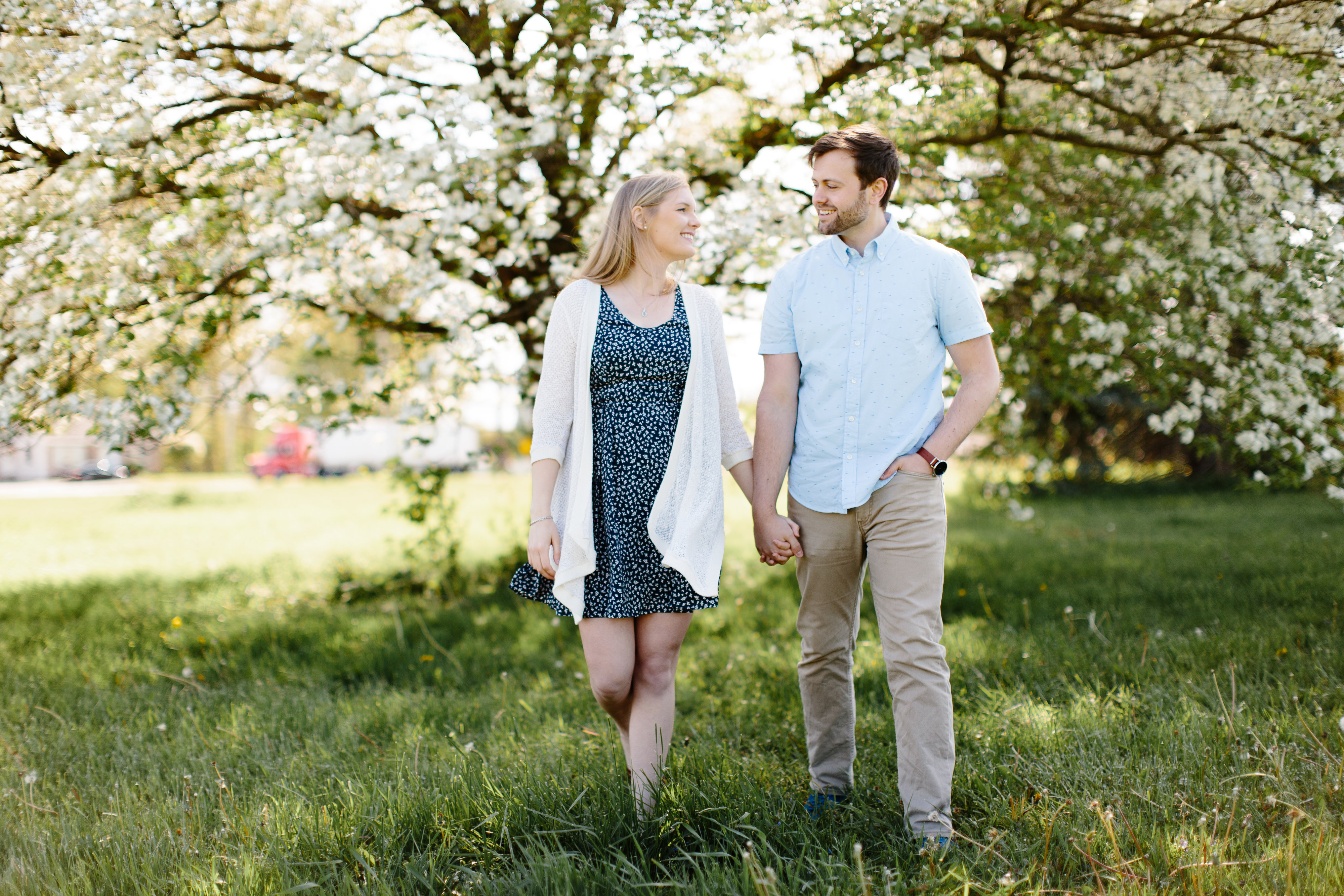 couple holding hands during spring couple session