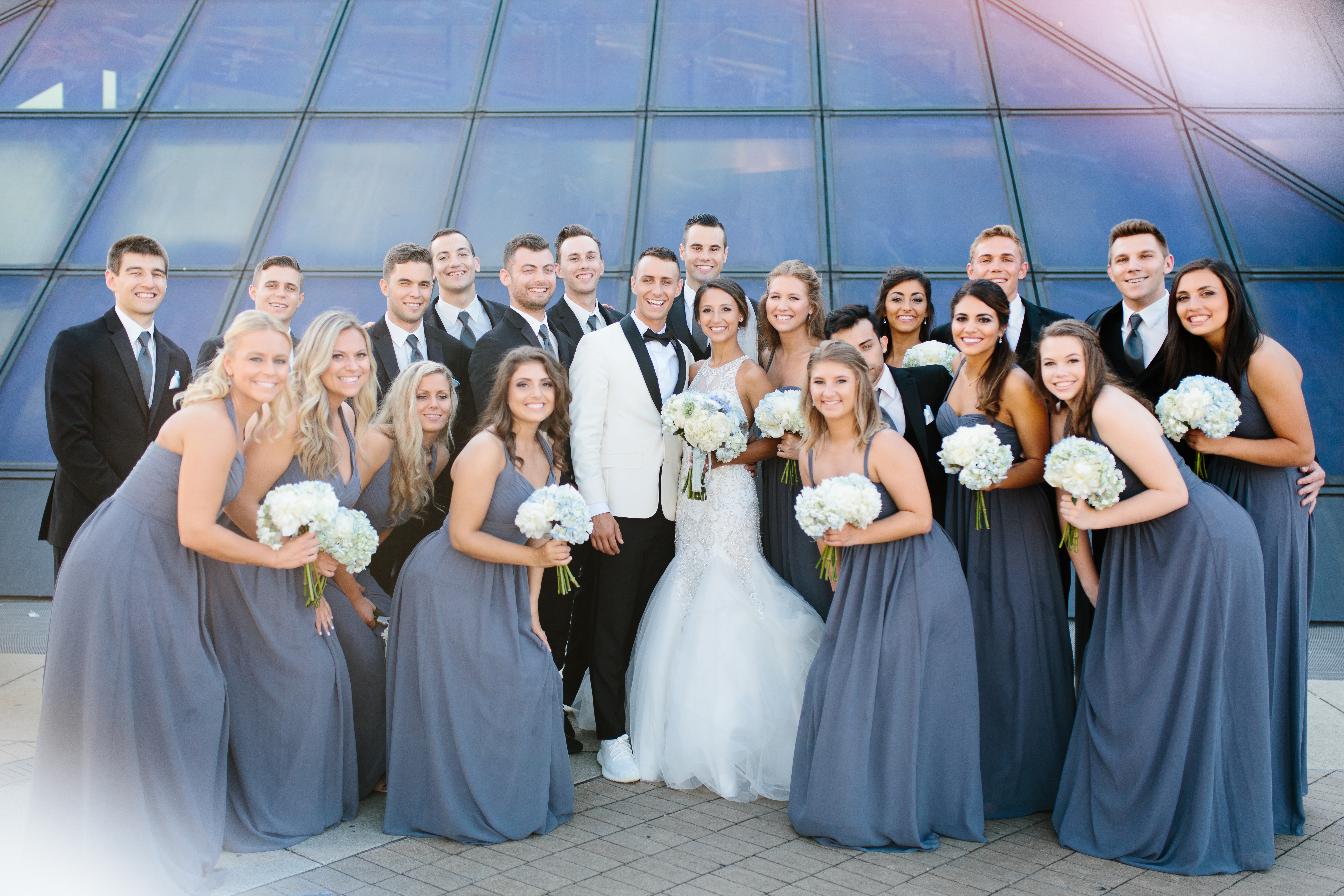 Wedding party portrait in front of Cleveland Rock Hall of Fame