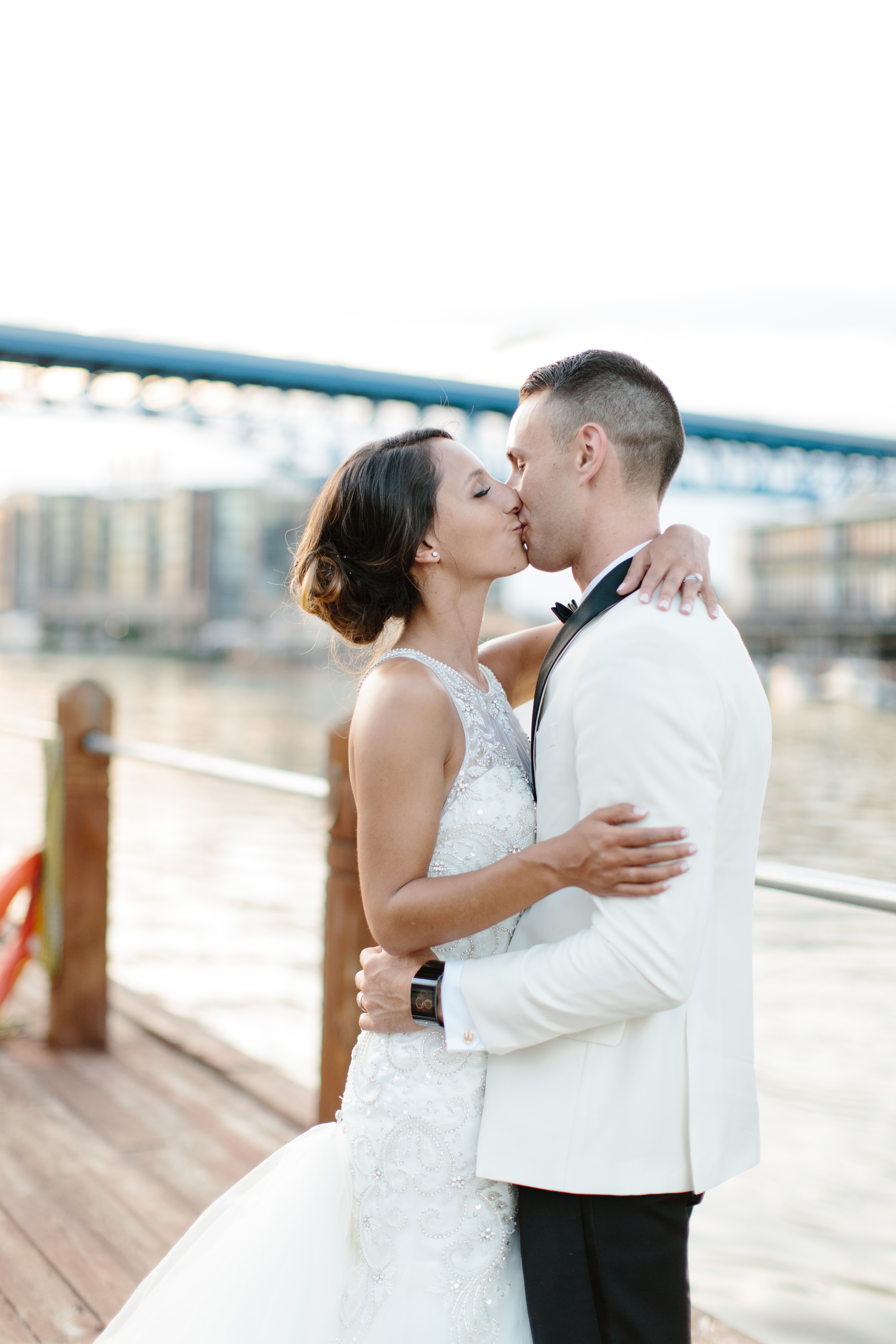 Couple kiss on Cleveland waterfront wedding