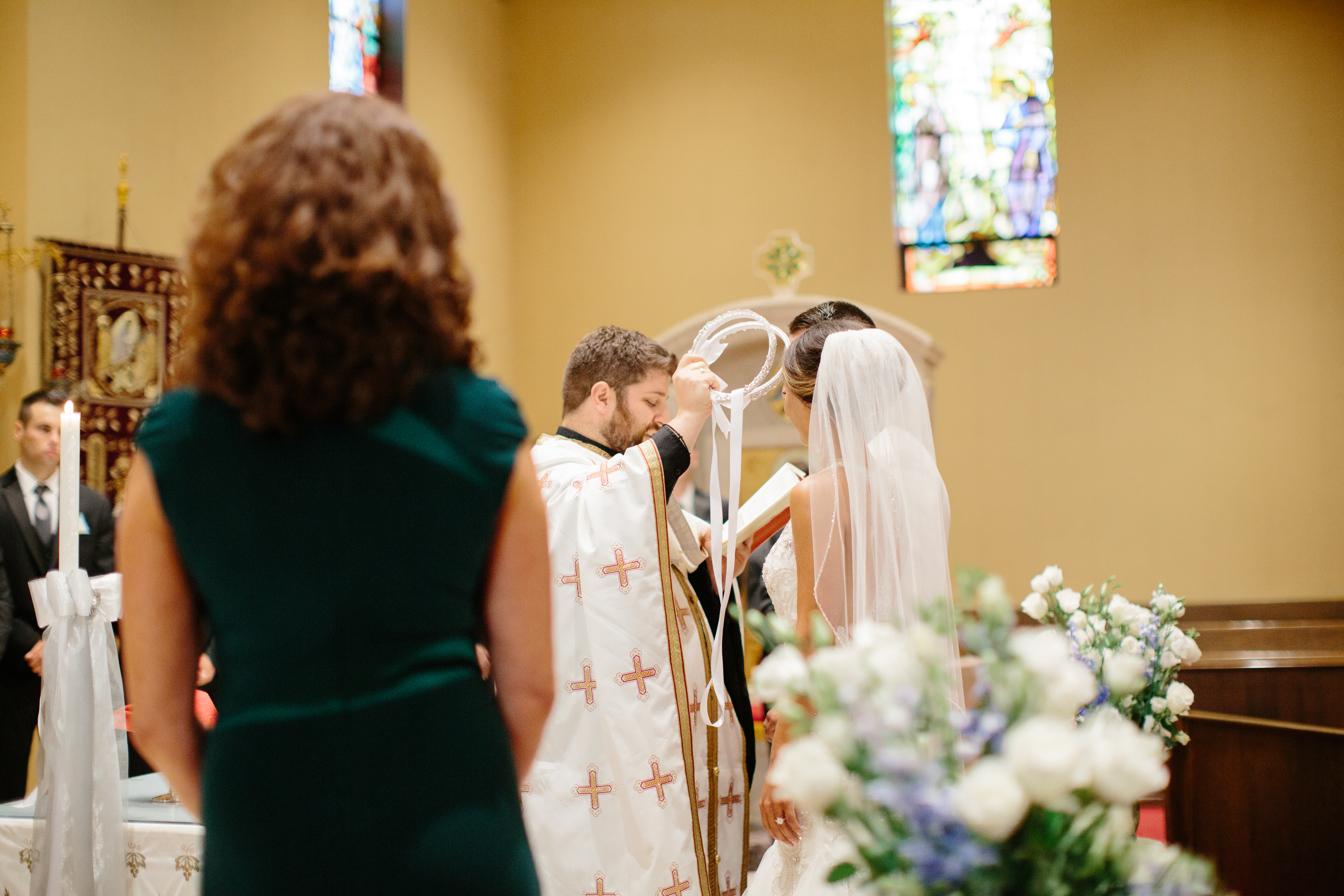 Wedding couple crowned during Greek Orthodox Wedding