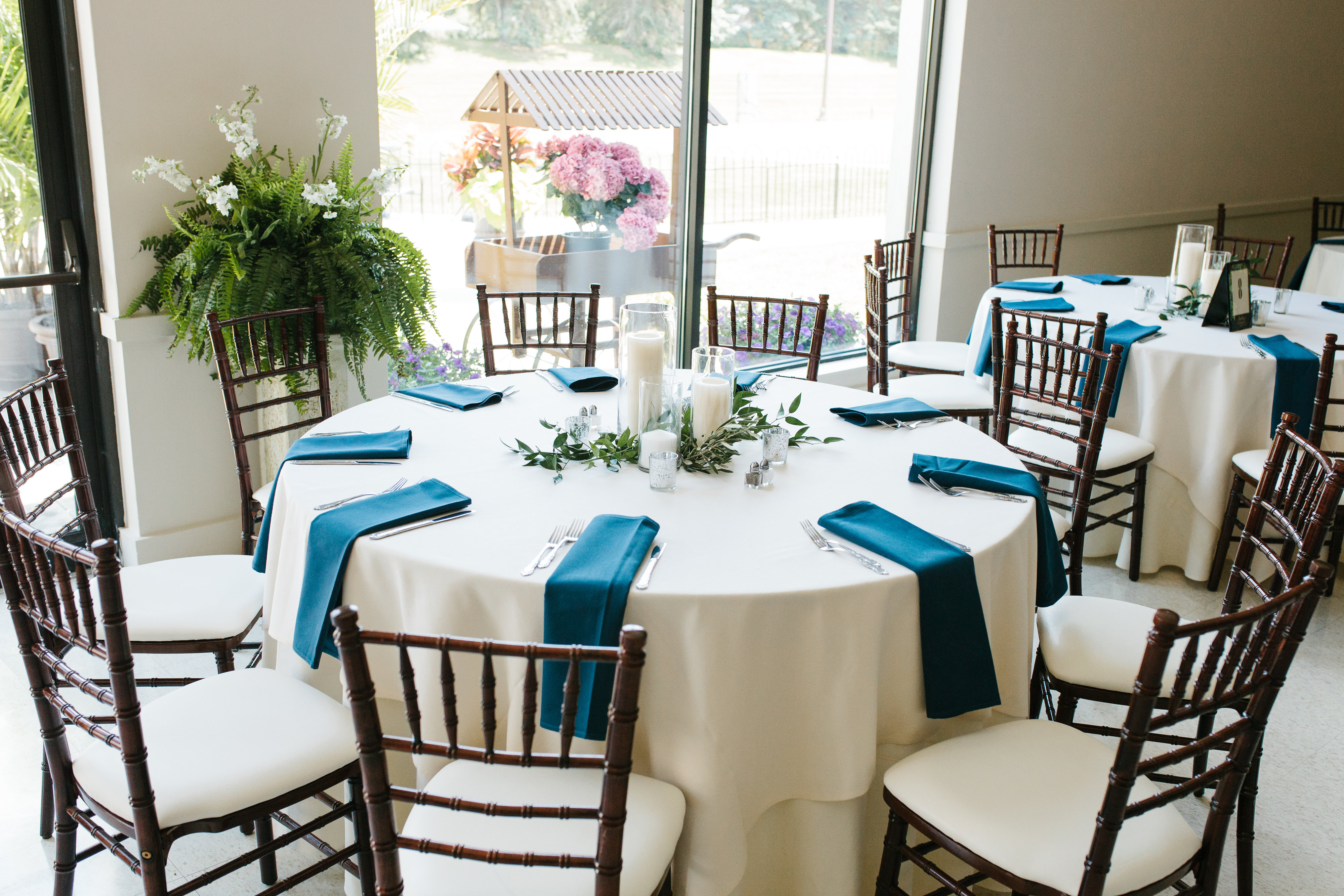 navy blue and greenery wedding decor