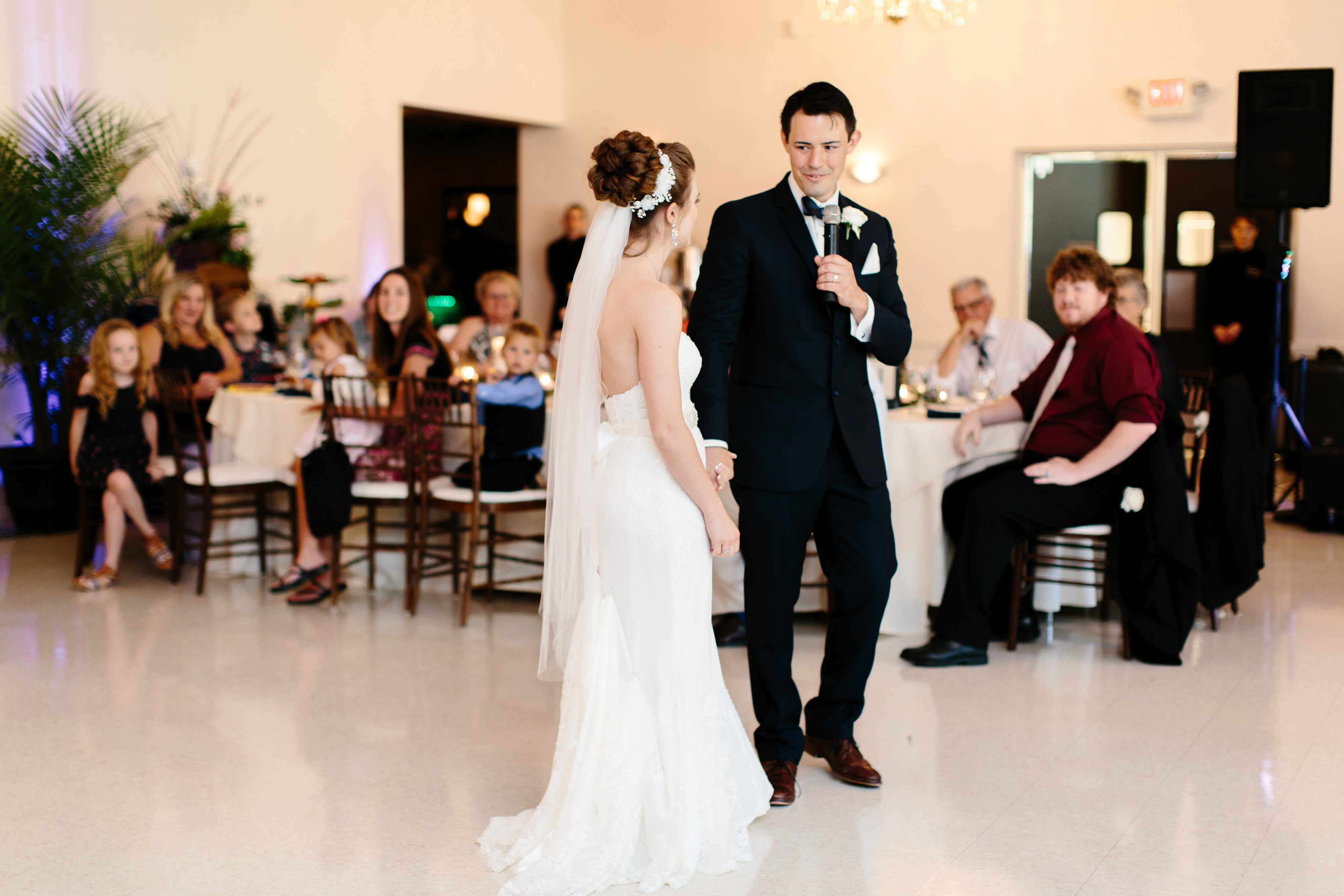 groom gives speech at wedding reception