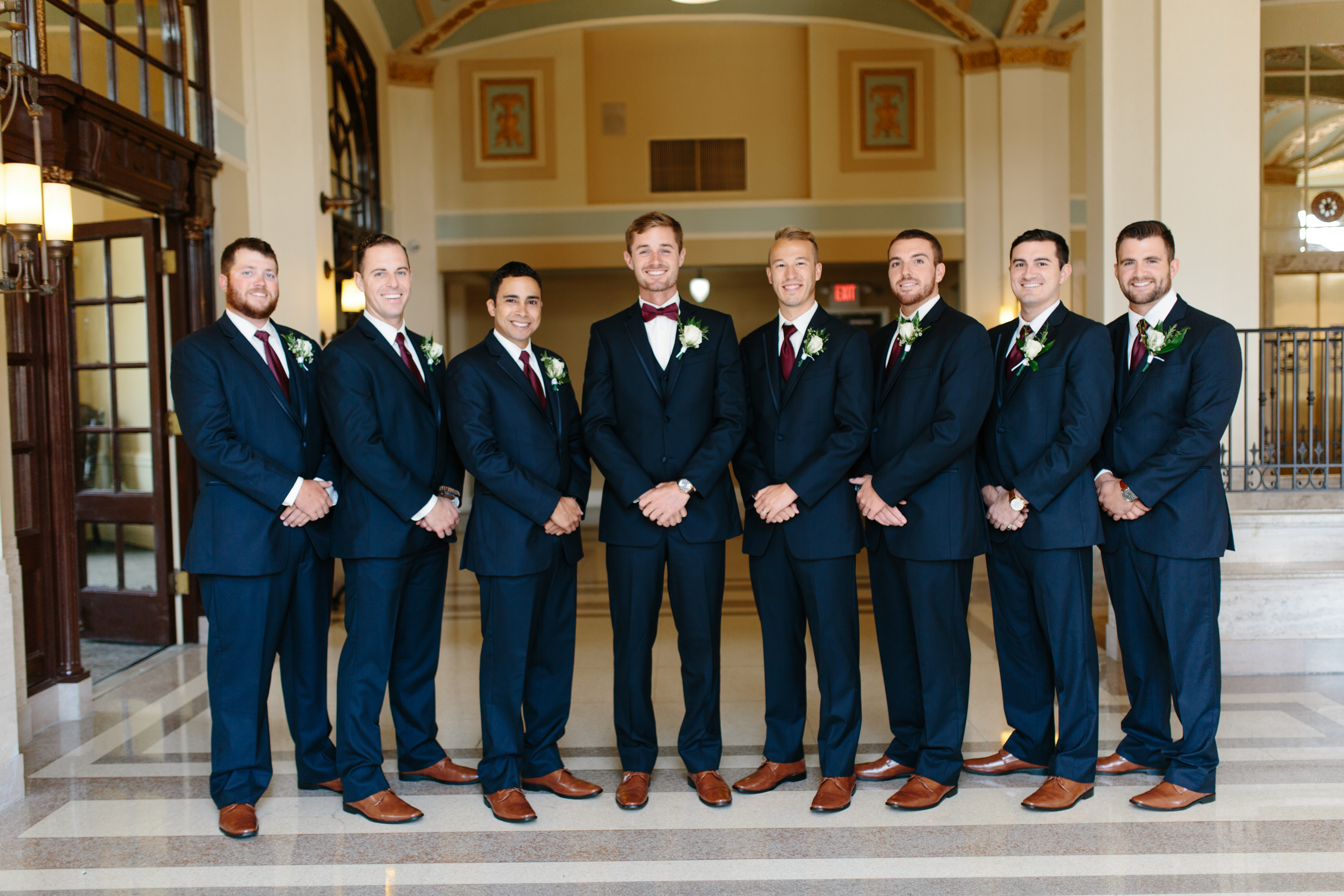 groom with groomsmen in navy and maroon a Historic Onesto