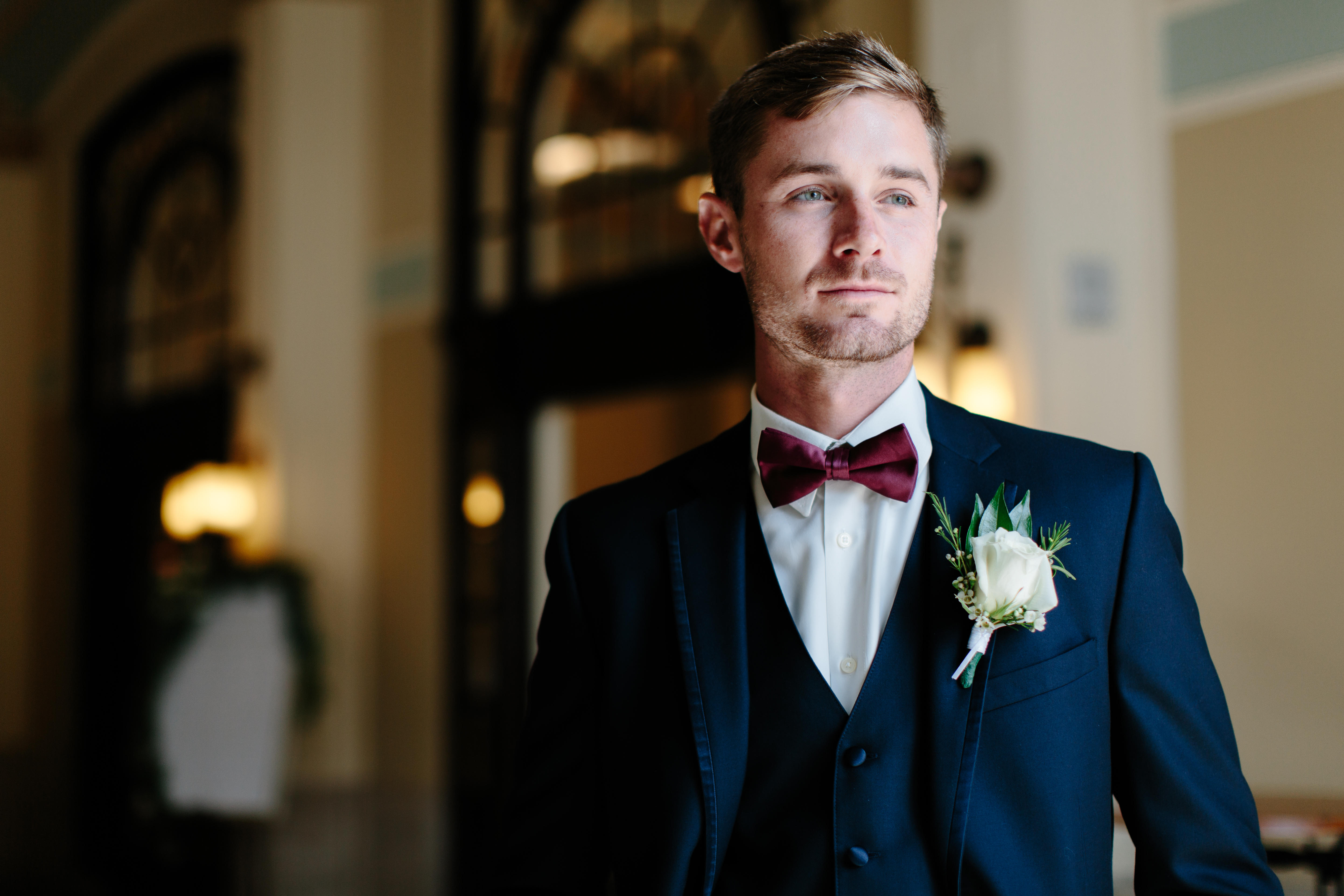 navy and maroon groom details at Historic Onesto