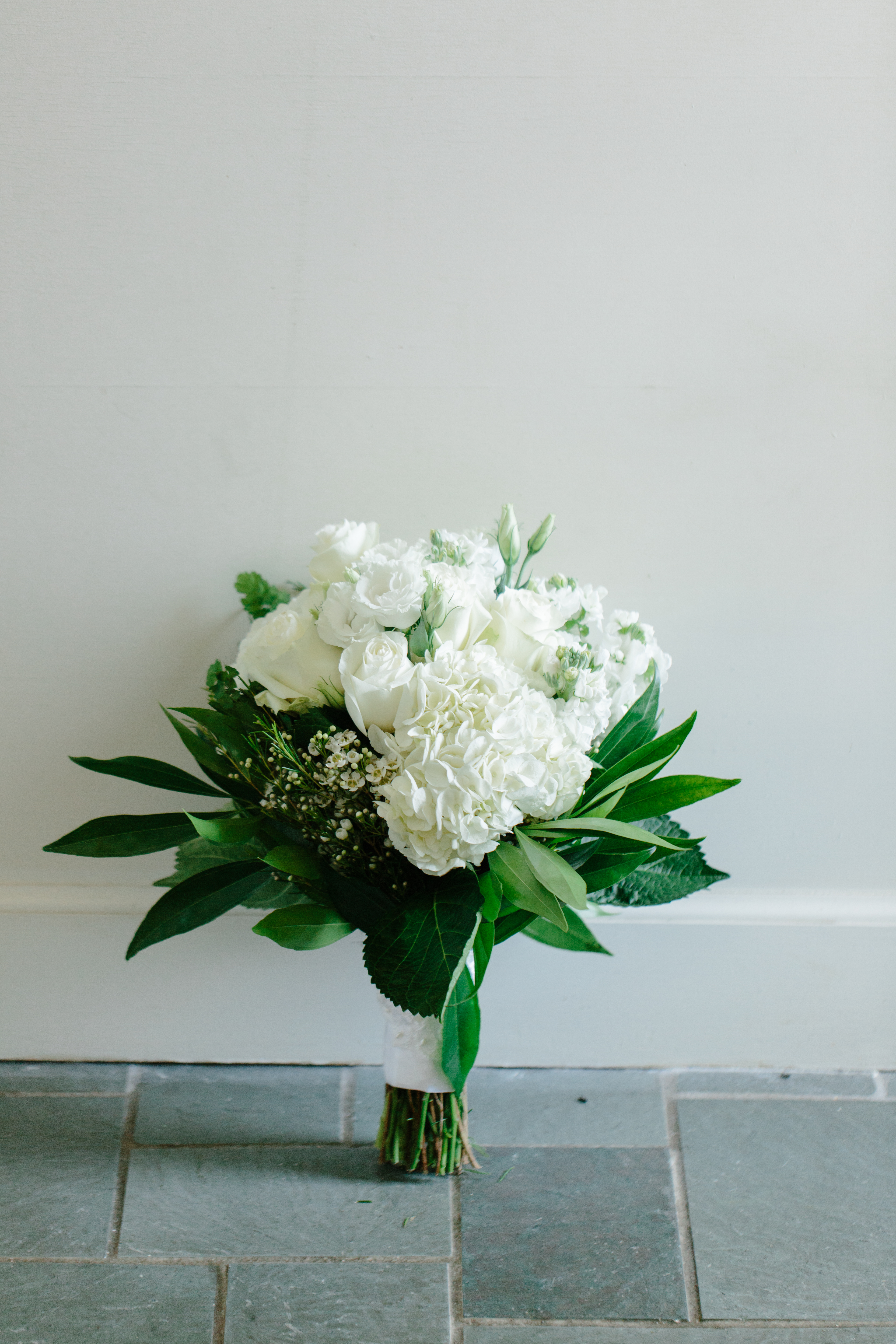 romantic white rose and hydrangea wedding bouquet