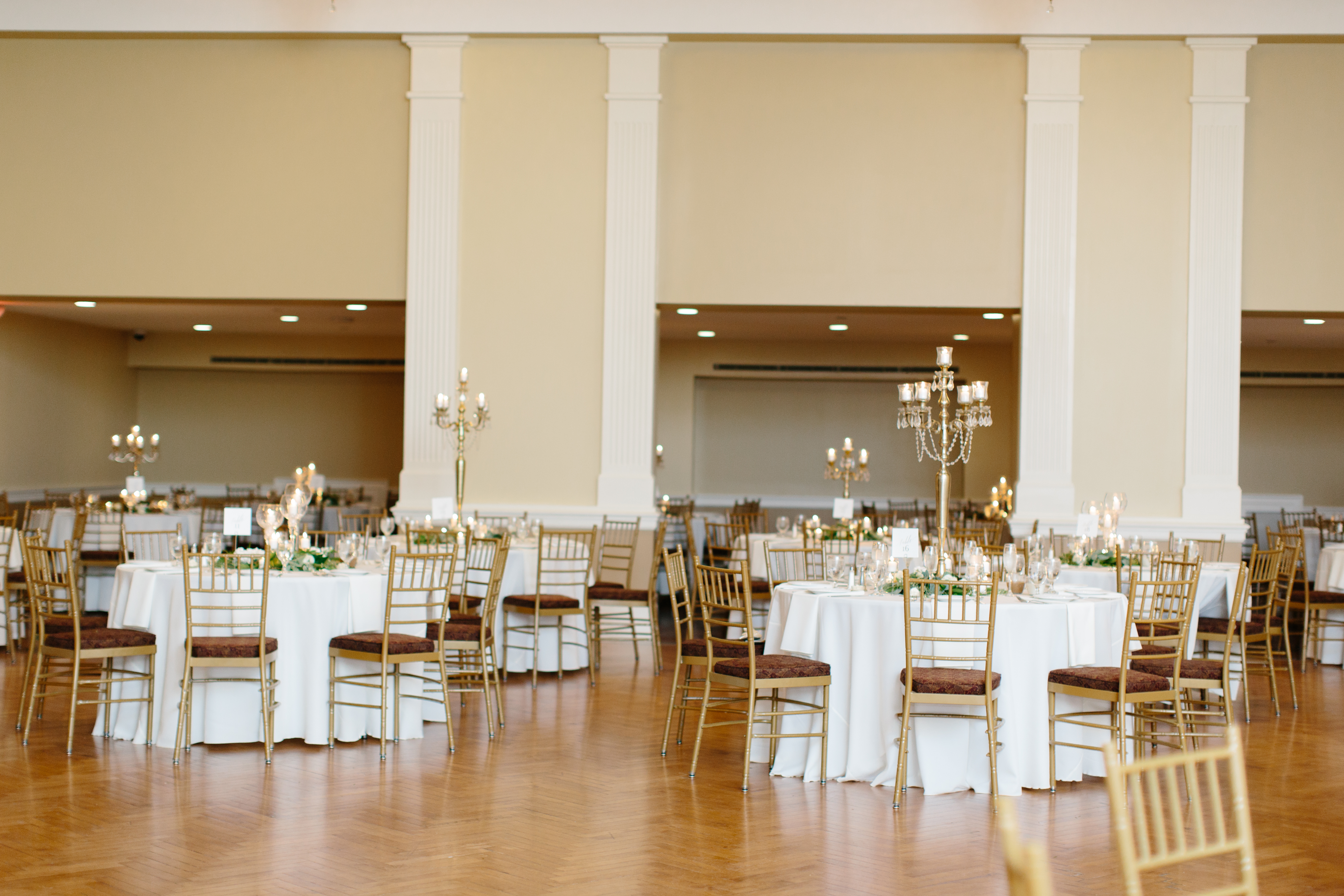 Historic Onesto loft wedding with gold candleabras