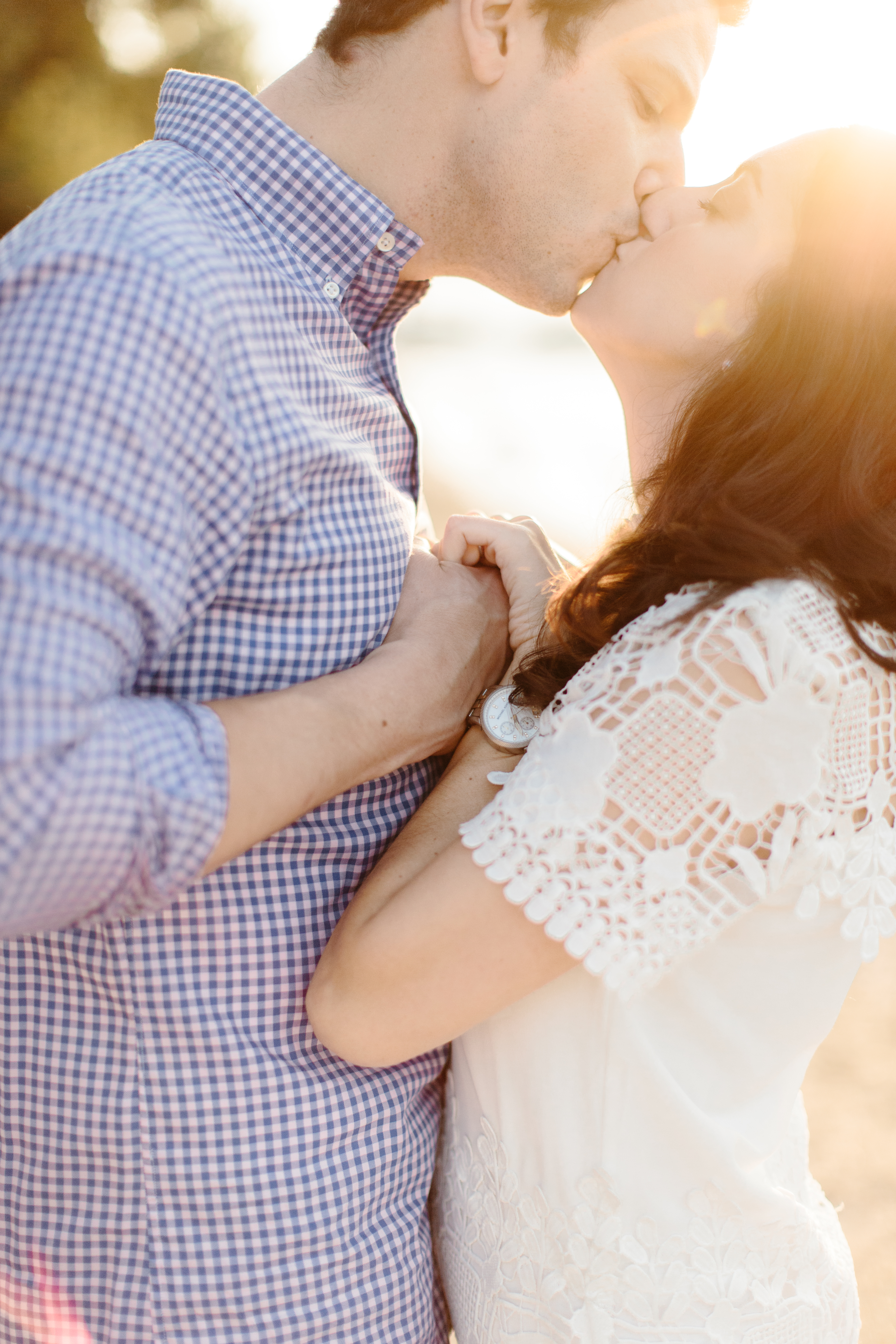 couple holding hands in engagement session