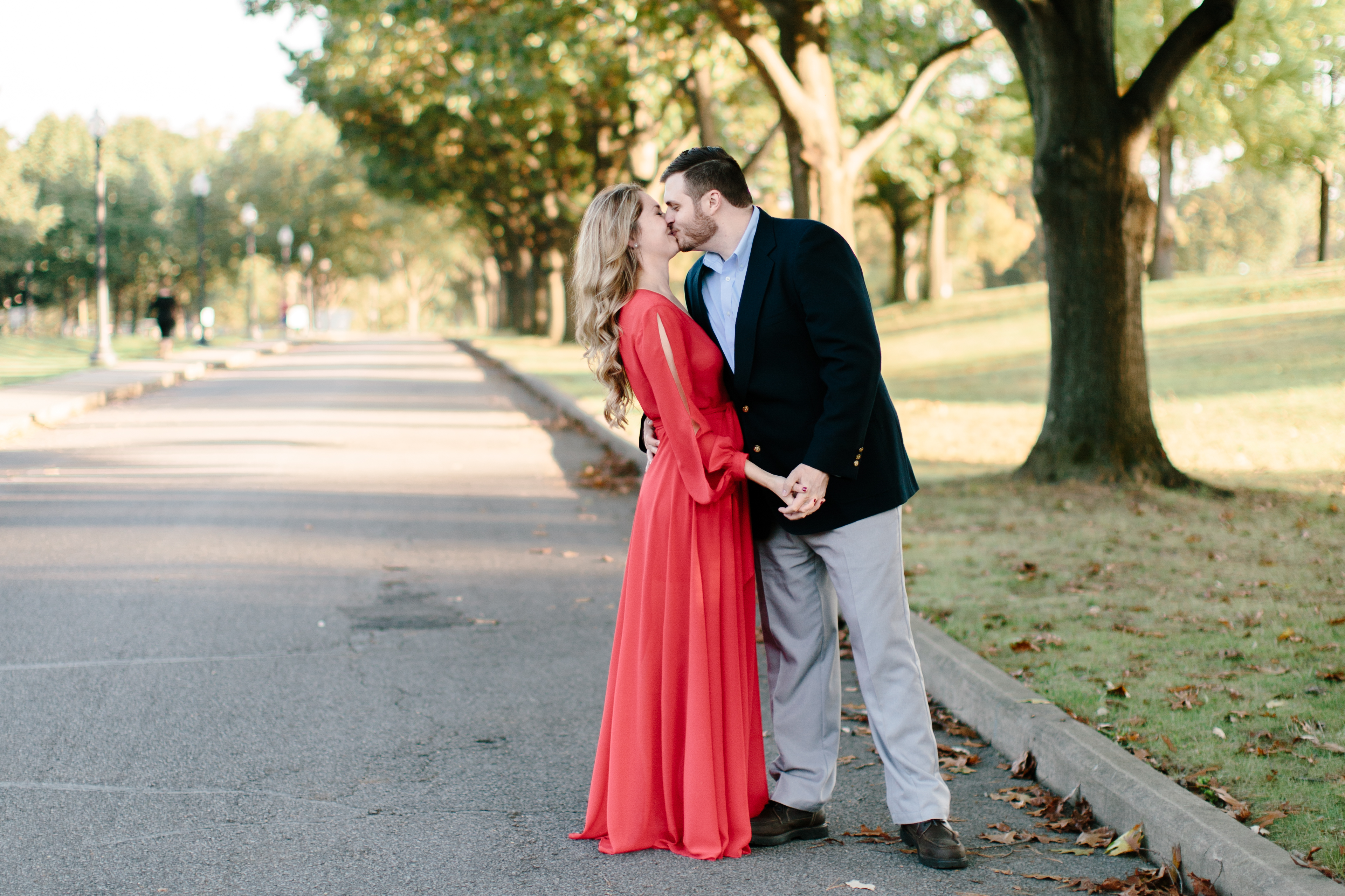 Kiss under a tree during romantic cleveland engagement session