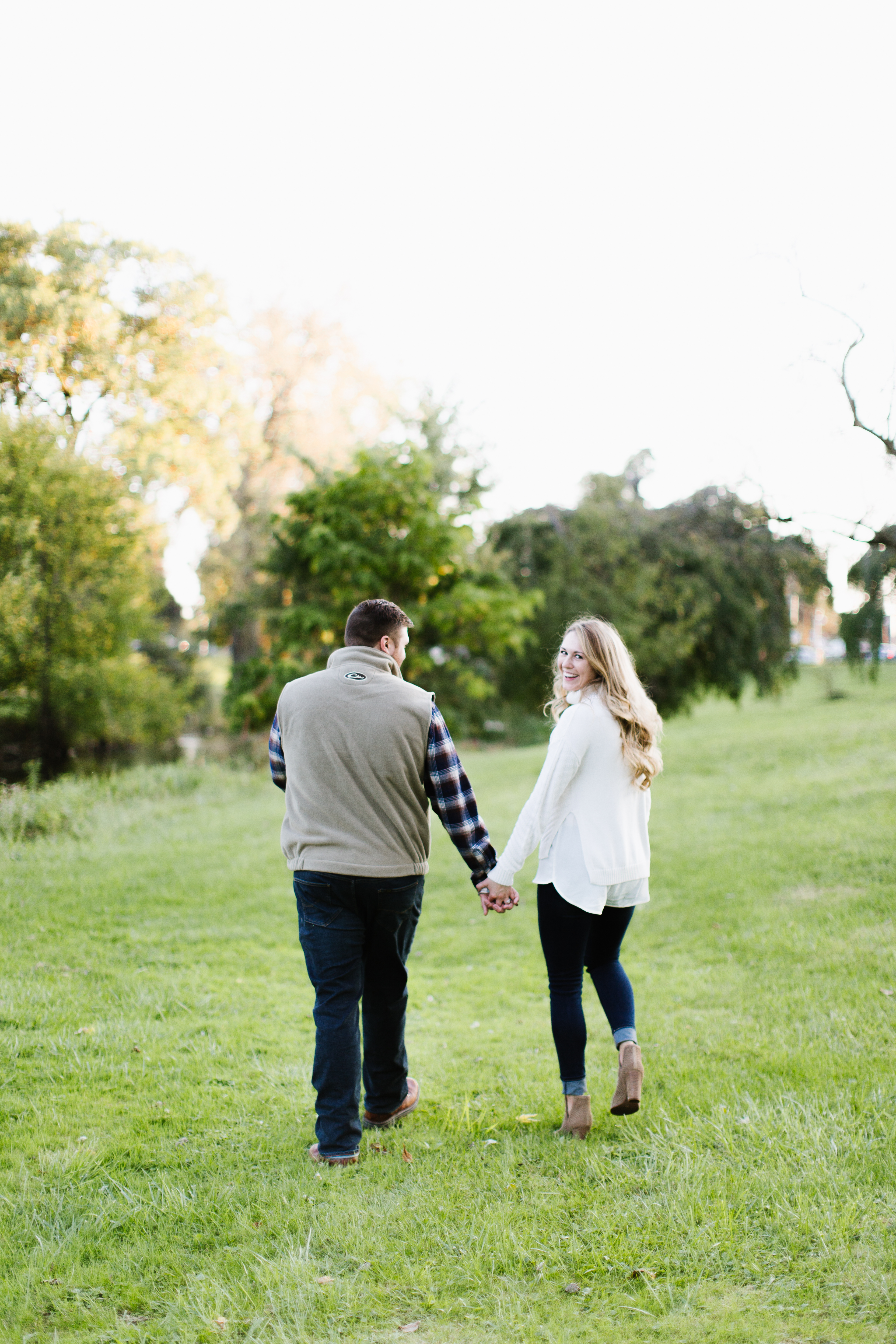 Couple walking during fall cleveland engagement session