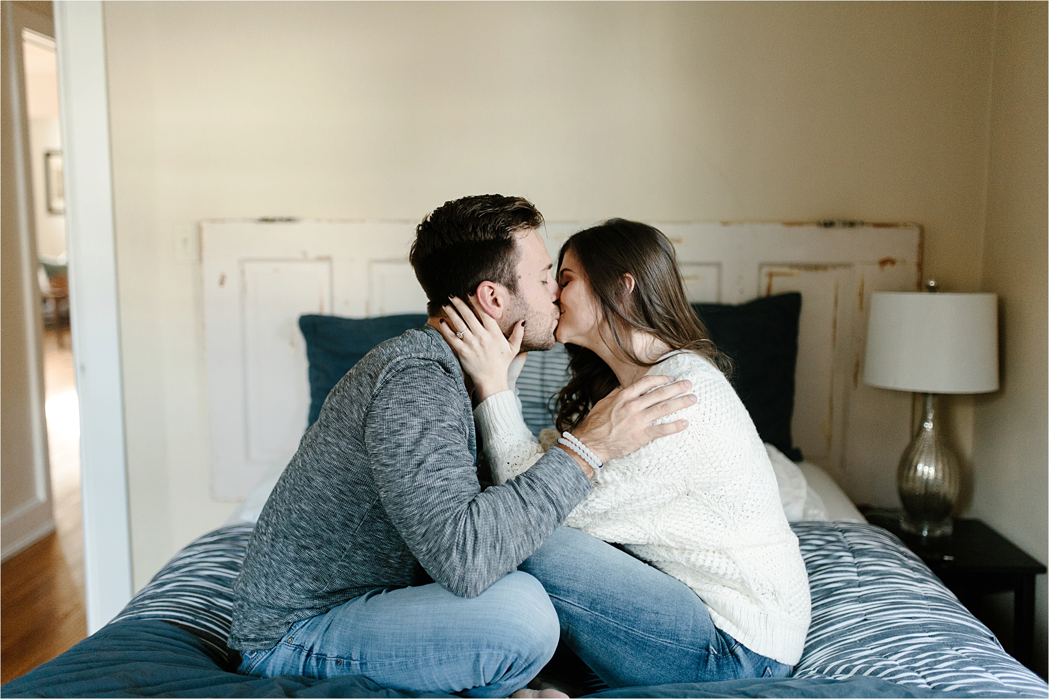 Cleveland Lifestyle Engagement couple cuddling in bed