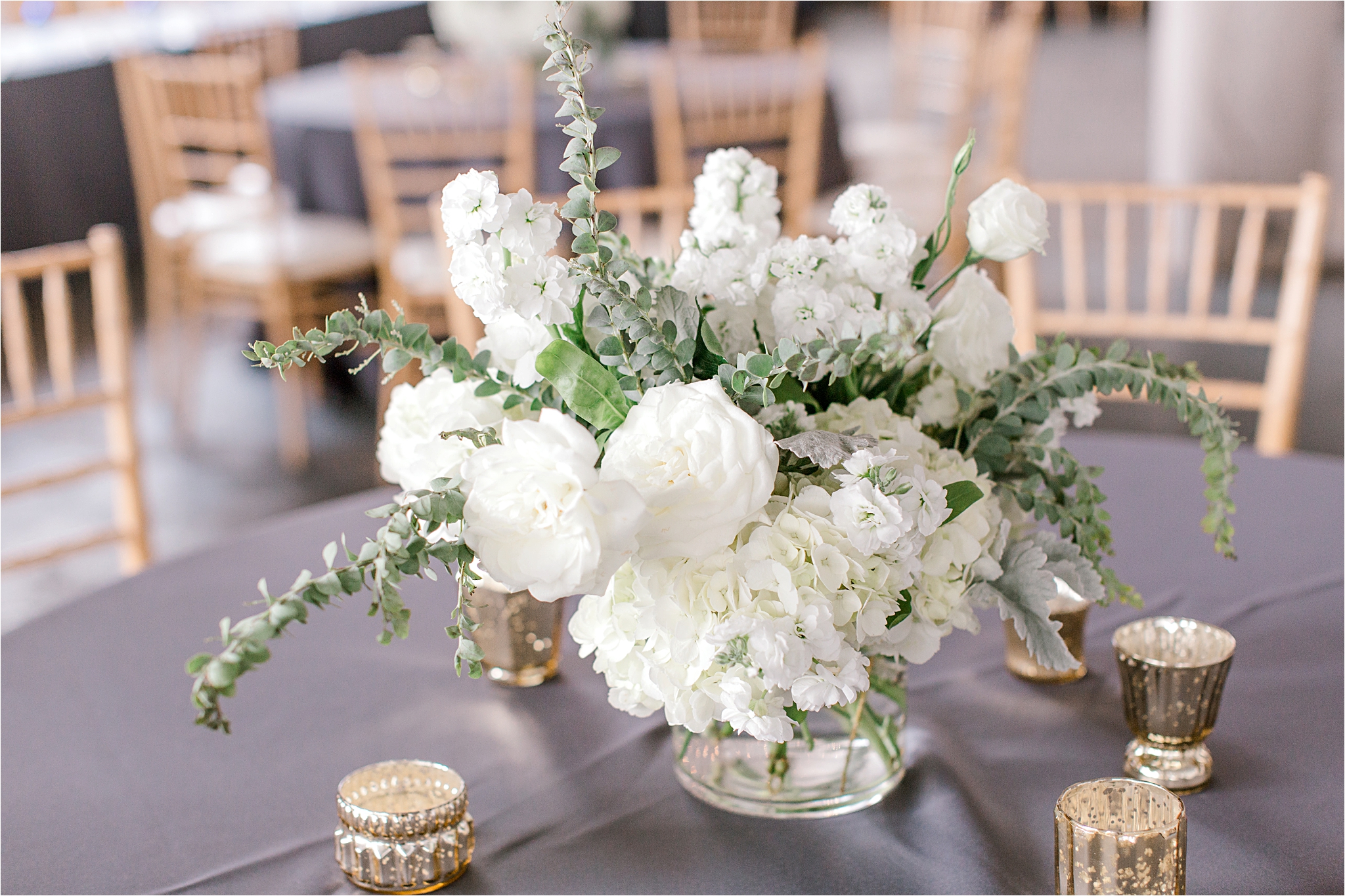 white and green neutral wedding centerpieces by we are wildflowers
