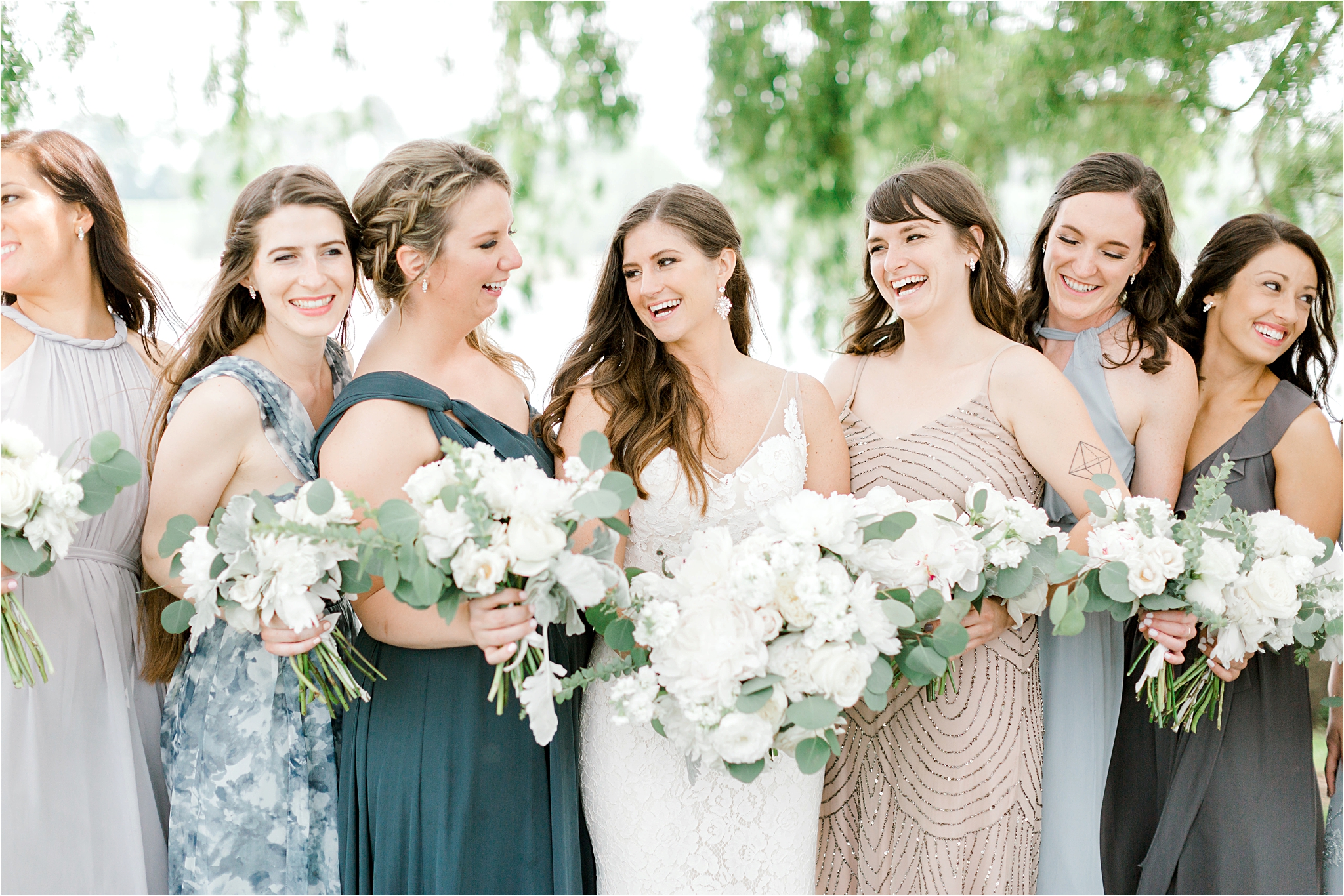 blue and neutral bridesmaid dresses and floral by we are wildflowers
