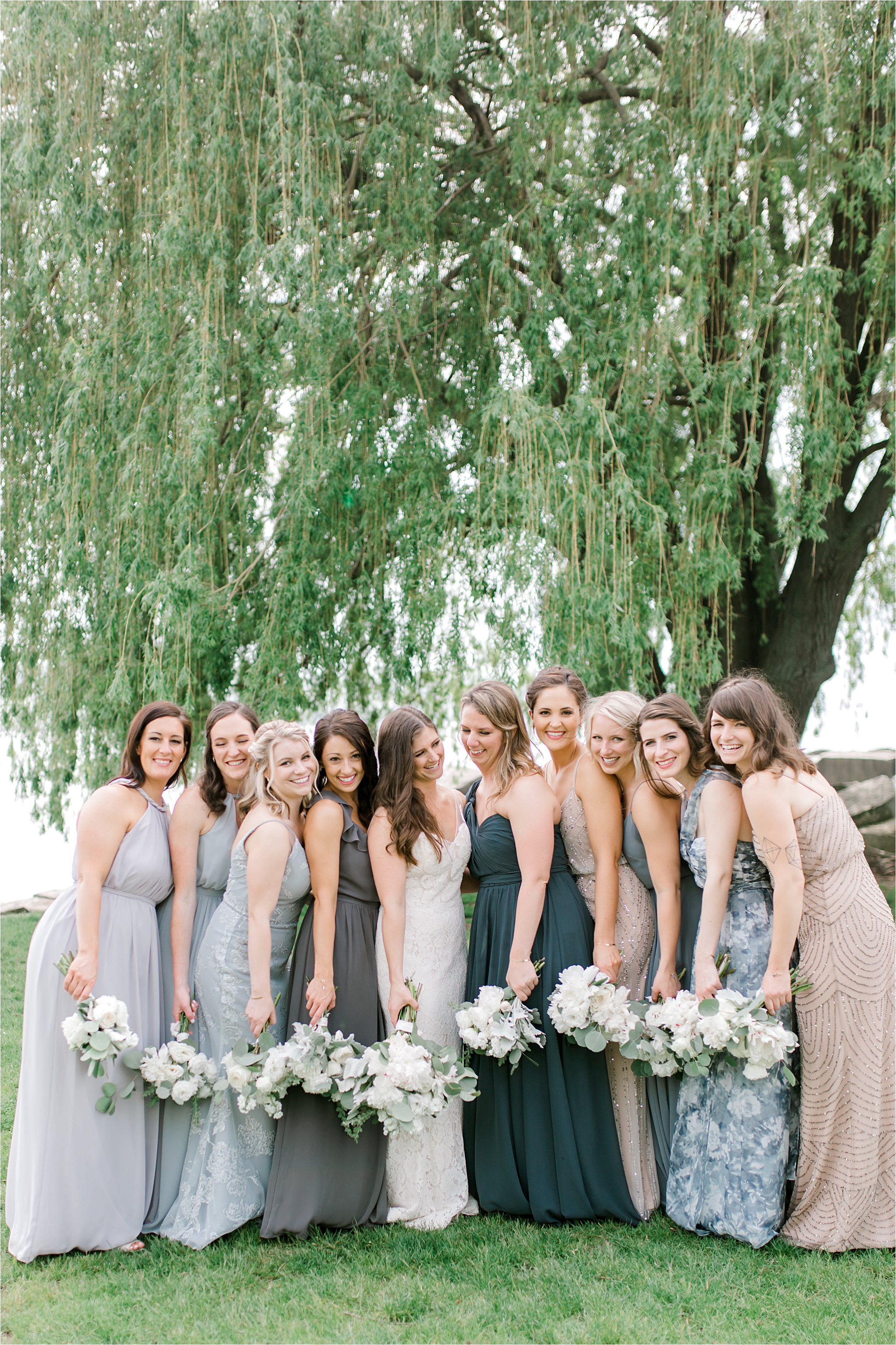 blue and neutral wedding bridesmaids at cleveland edgewater park 