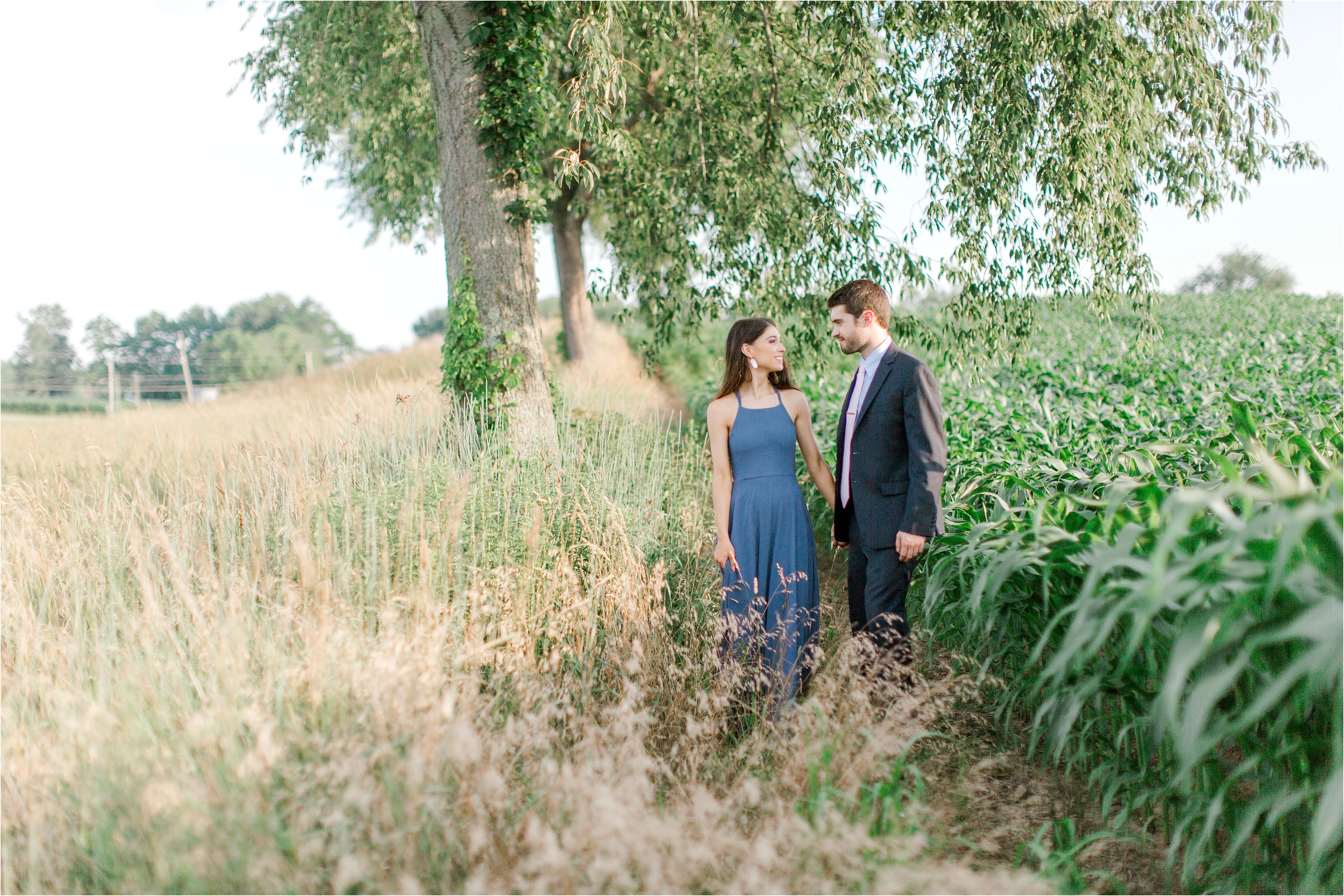 romantic engagement session by field