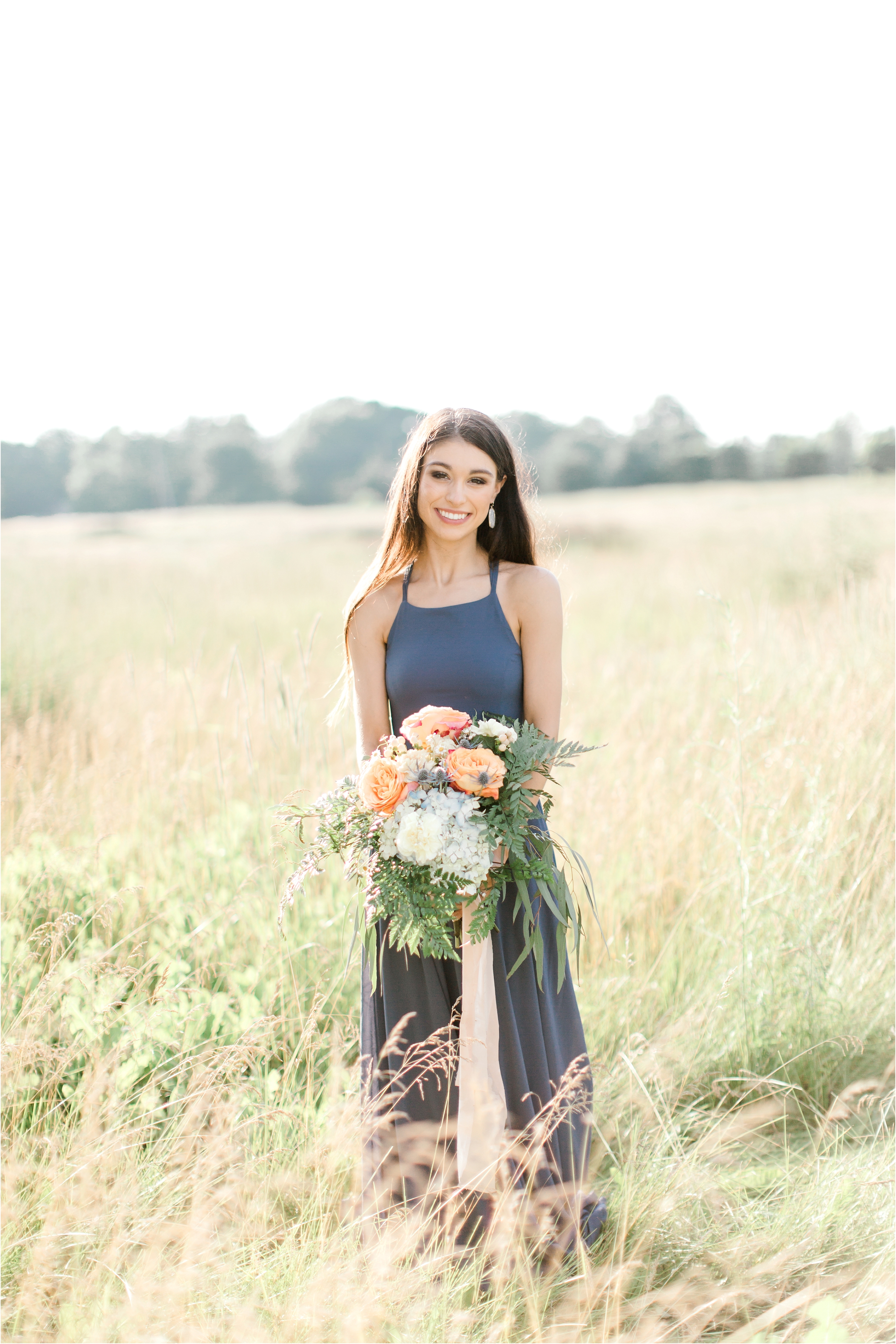 blue and peach wedding bouquet field engagement session