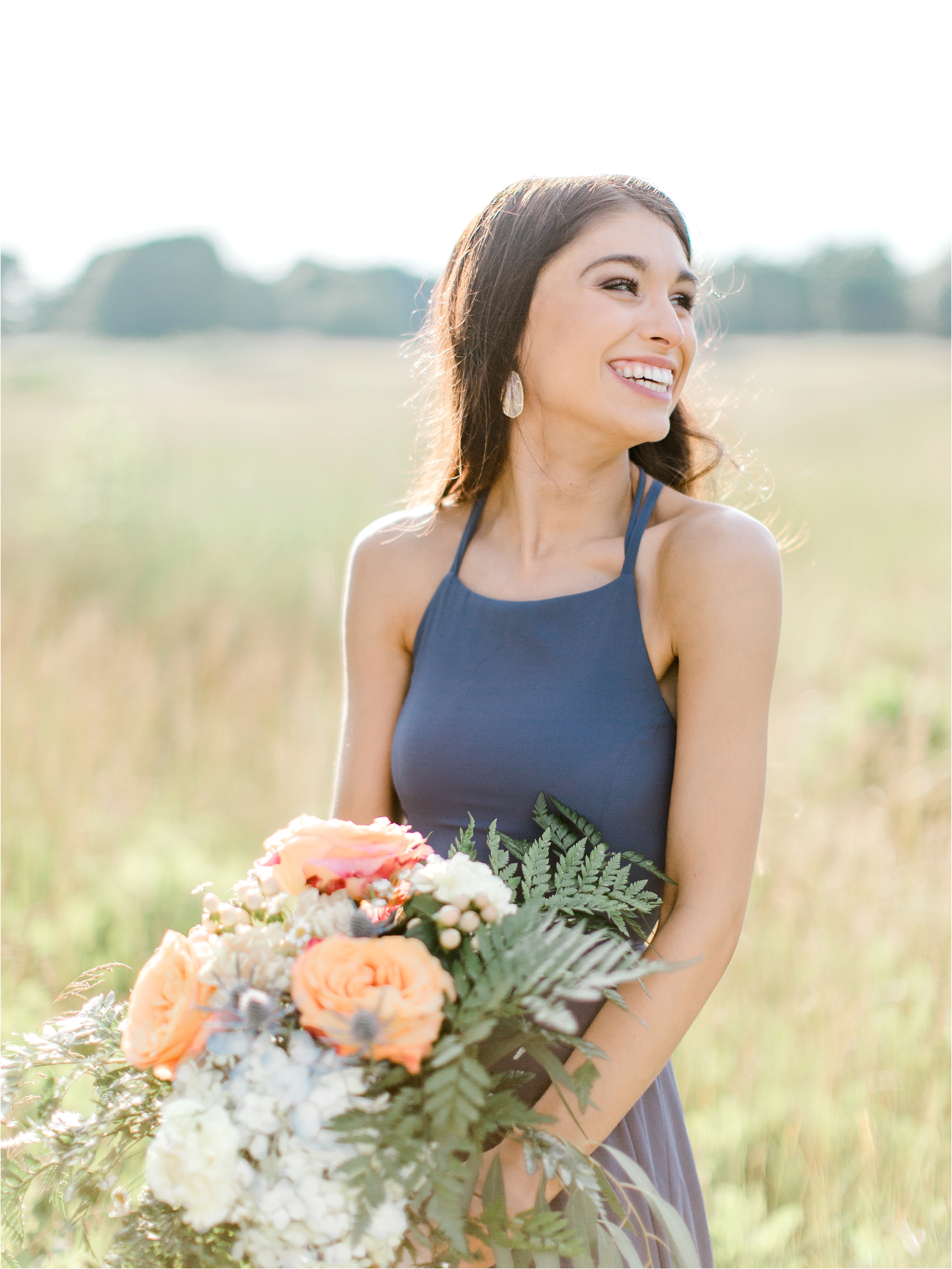 blue dress for engagement session in field