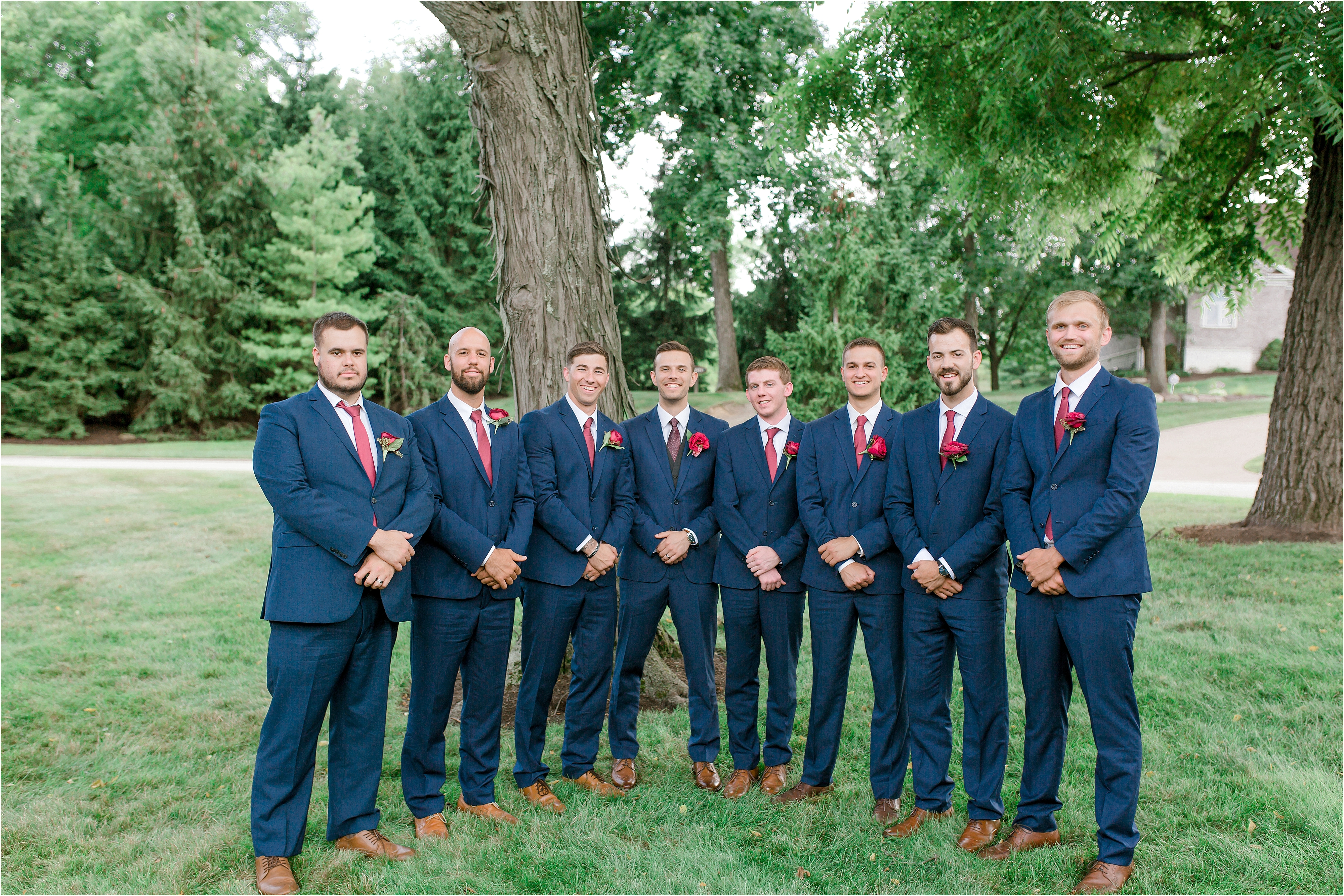 navy and red groomsmen attire