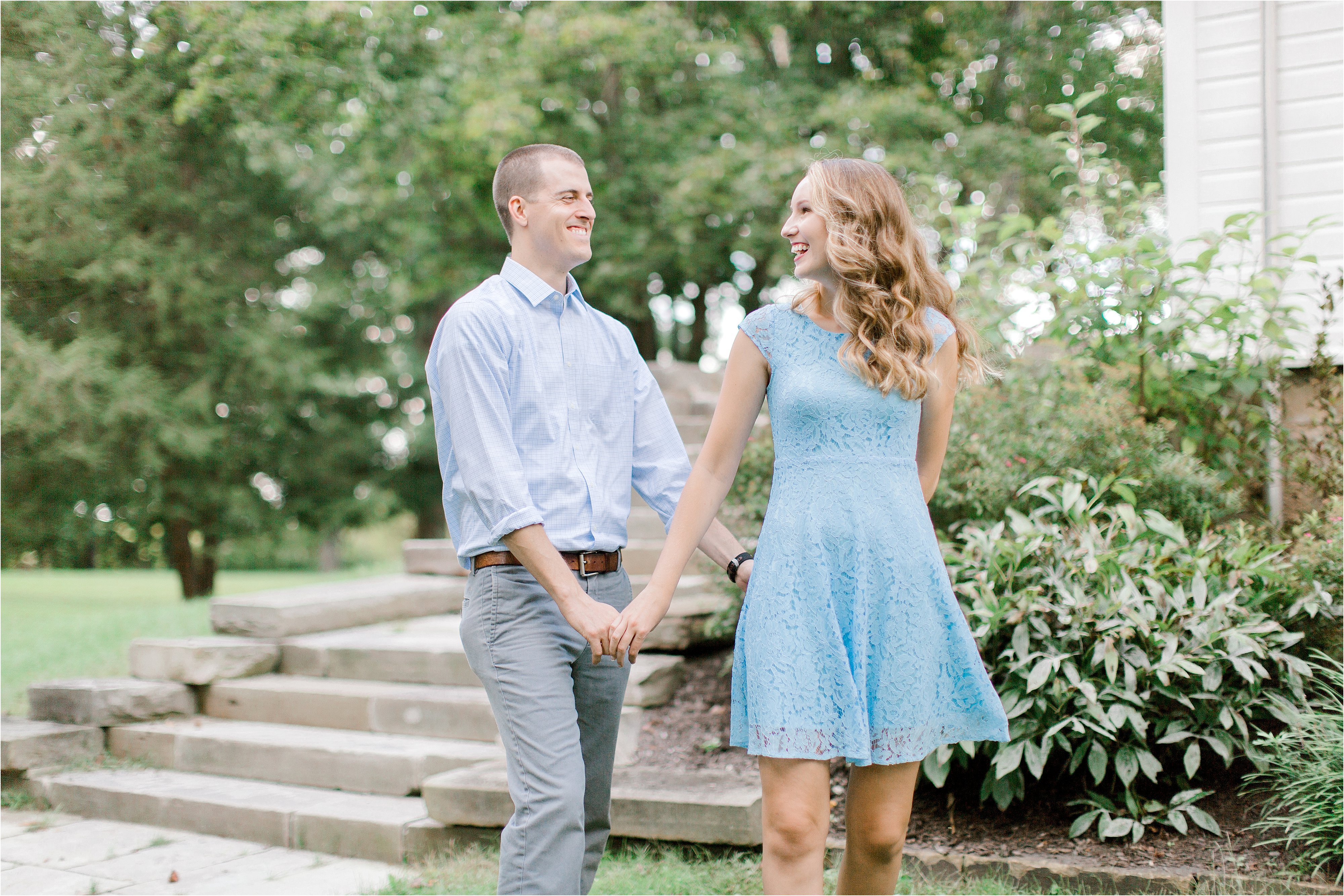 couple holding hands during cleveland engagement session