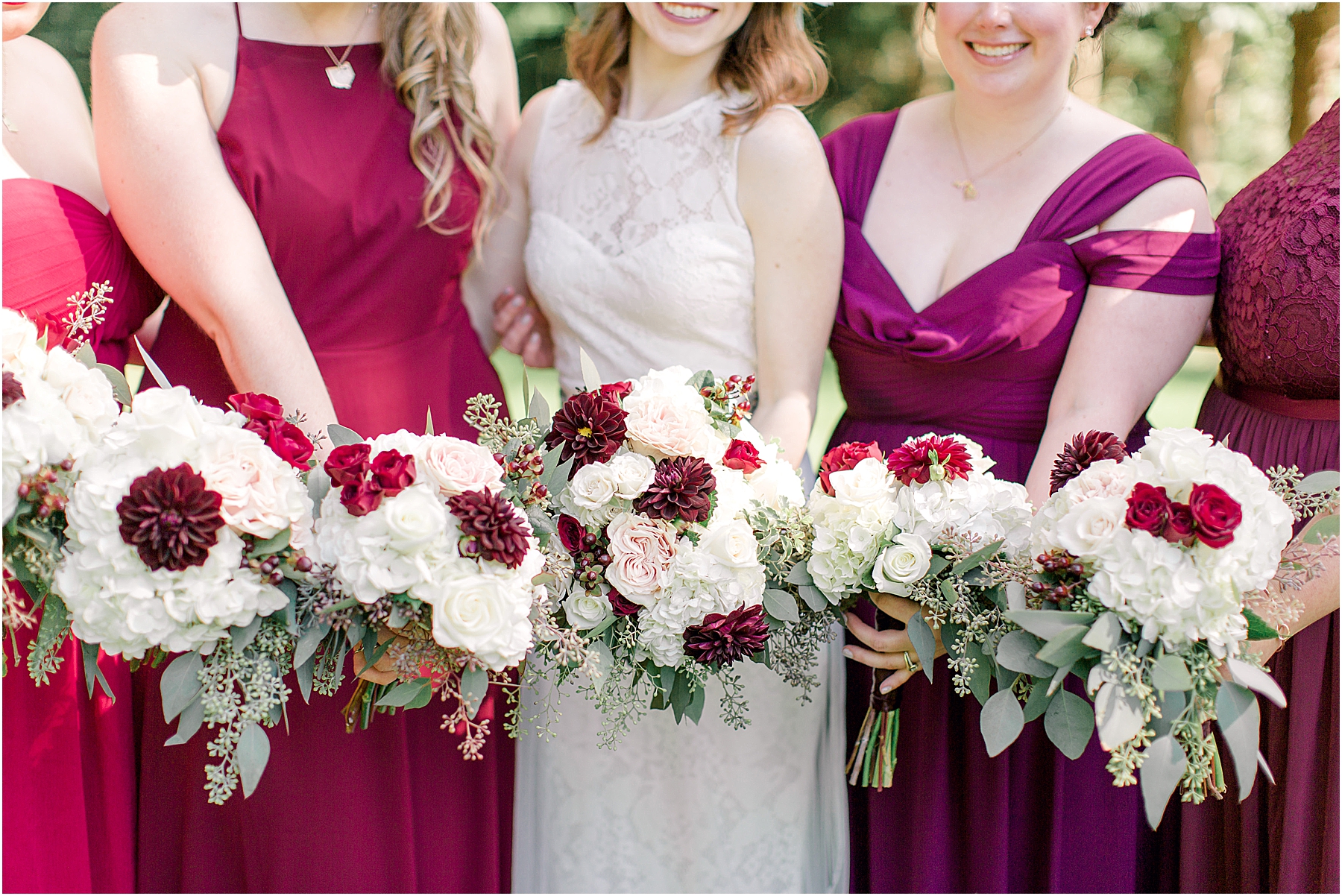 maroon and white wedding bouquets with seeded eucolyptus