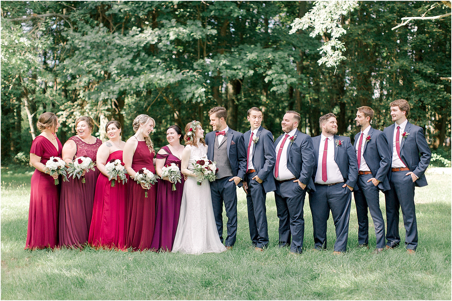 shades of red and blue summer camp wedding in the midwest
