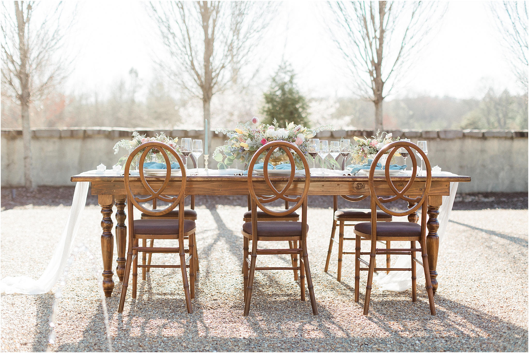 blue and pink table setting at french countryside wedding