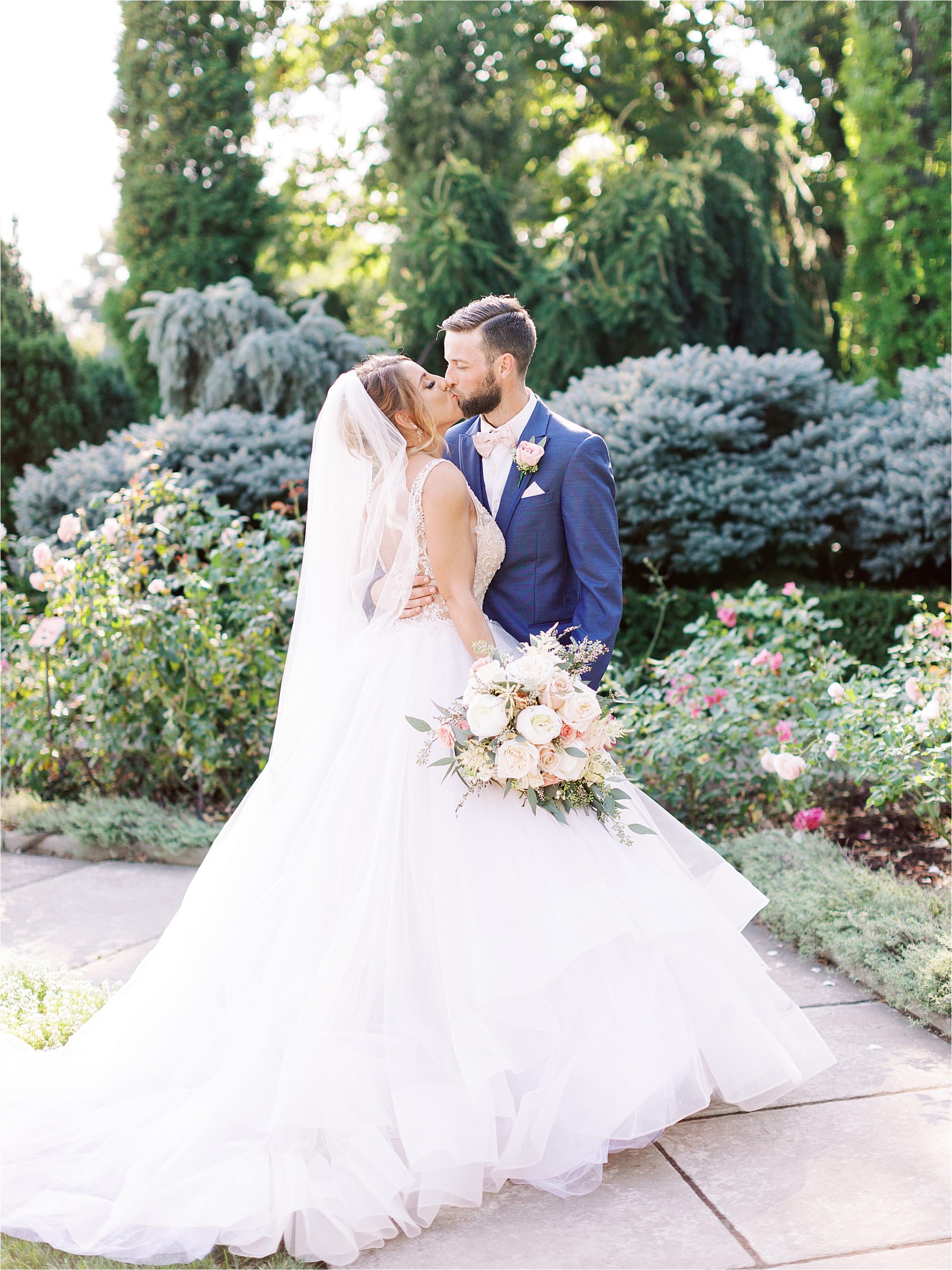 Wedding portraits in Cleveland Botanical Gardens by Canton wedding photographers