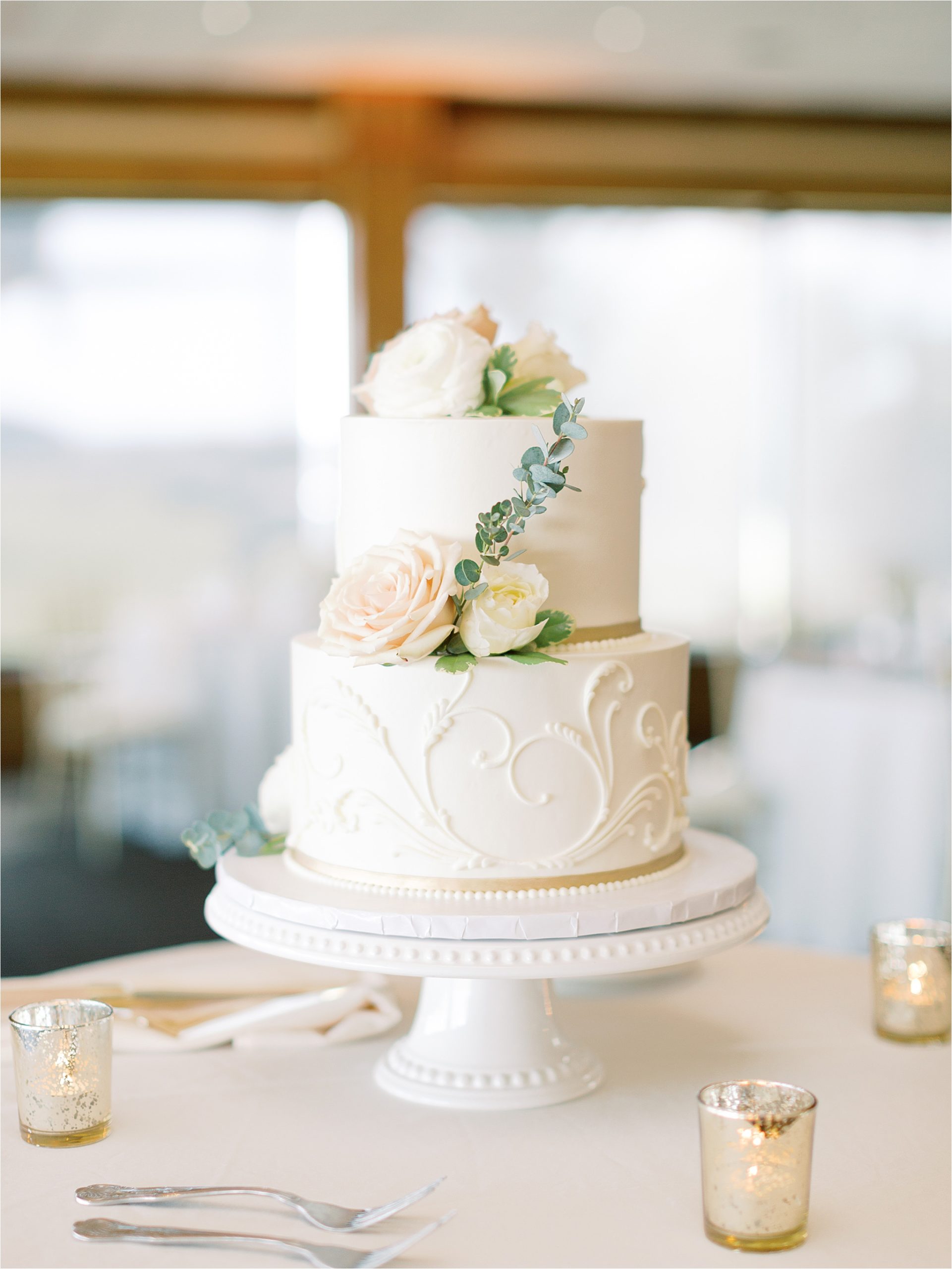 simple white wedding cake at romantic cleveland wedding