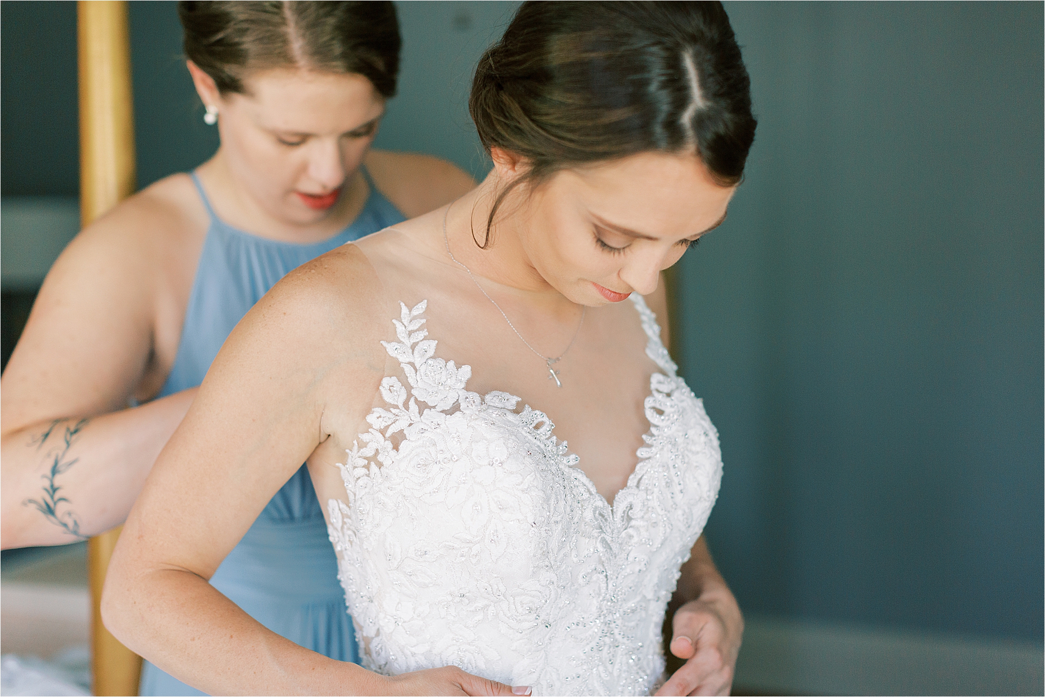 Bride gets into Allure Bridals ball gown