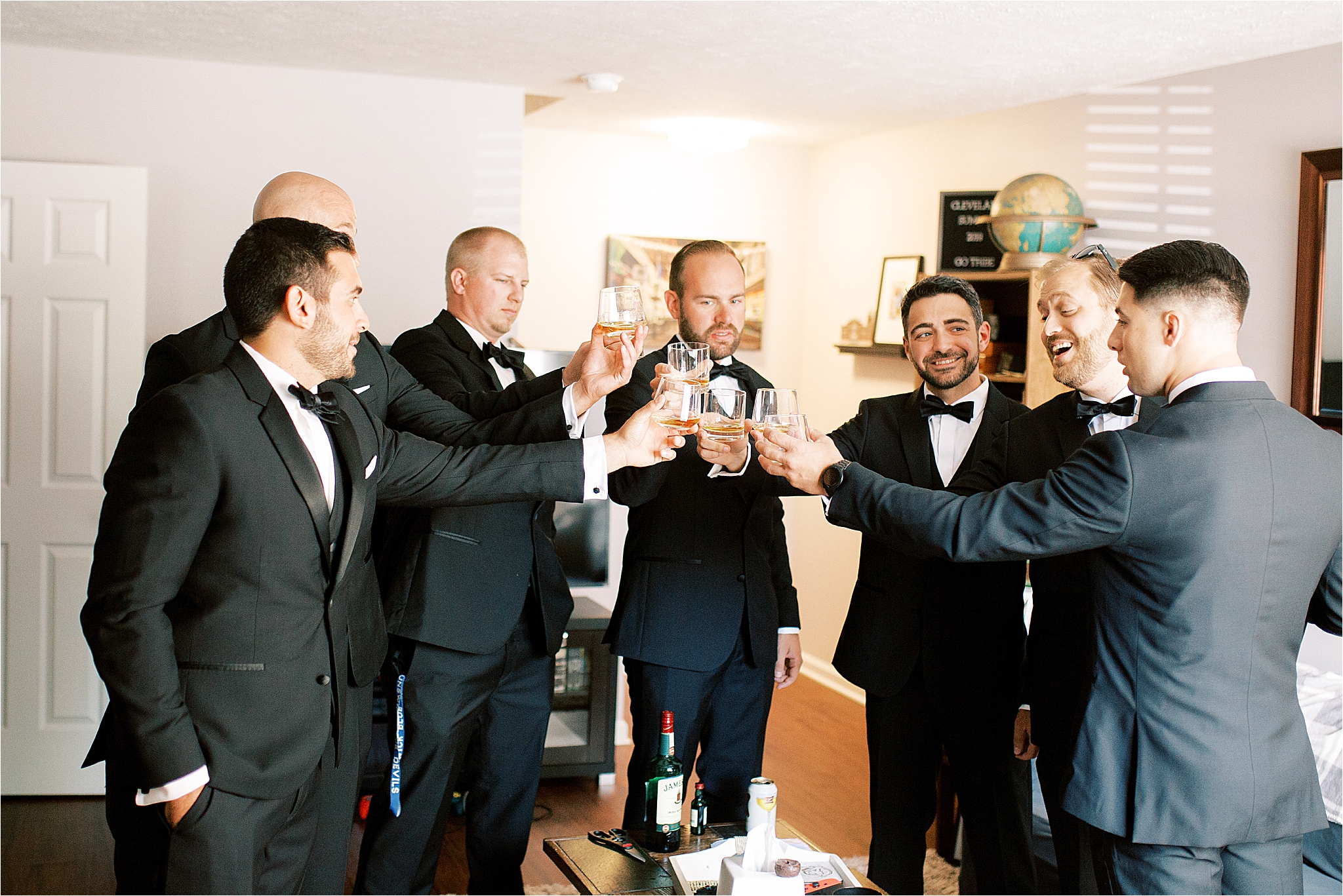 Groom toasting before Cleveland Wedding Ceremony