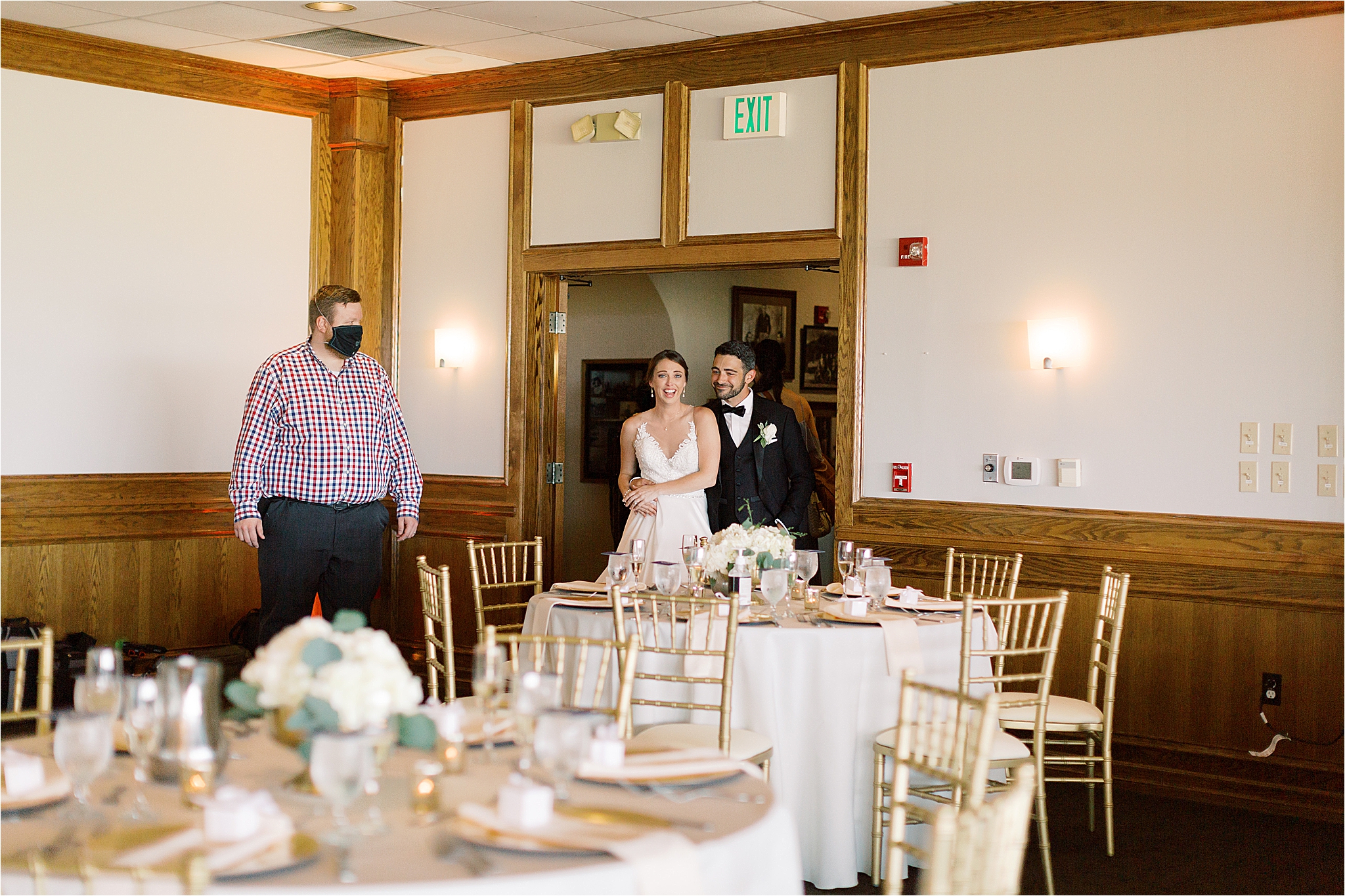 Bride and groom see reception space