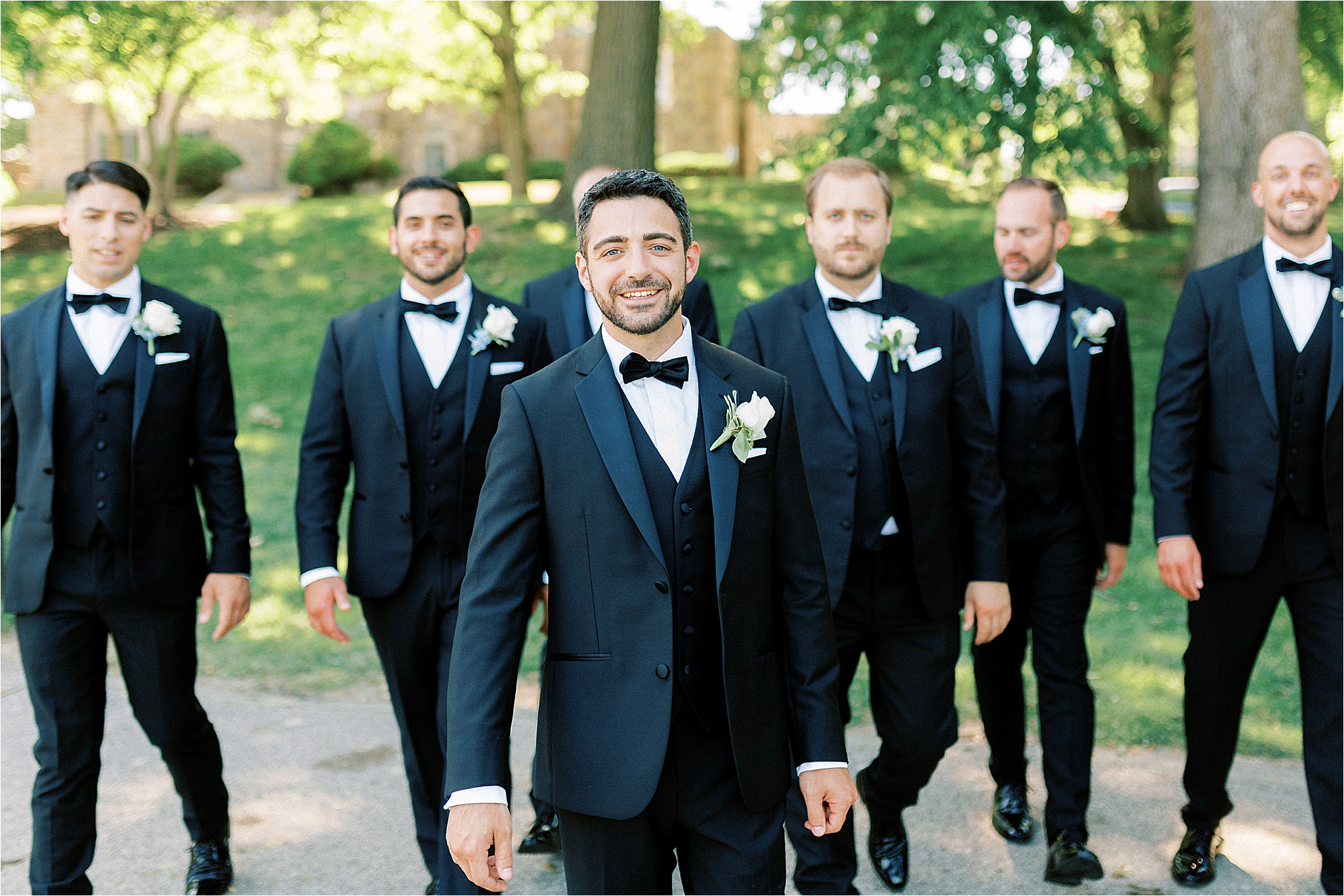 Groom and groomsmen wear The Black Tux in Romantic Cleveland Wedding