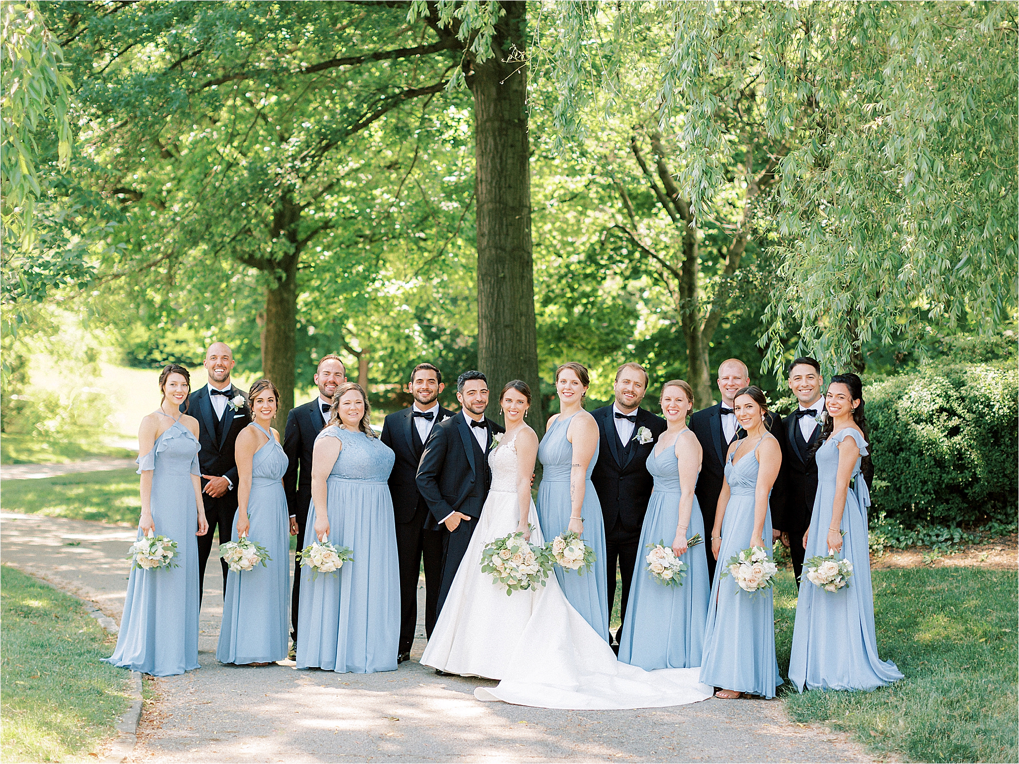 Bridal party in light blue at Cleveland Wedding by Austin & Rachel Photography
