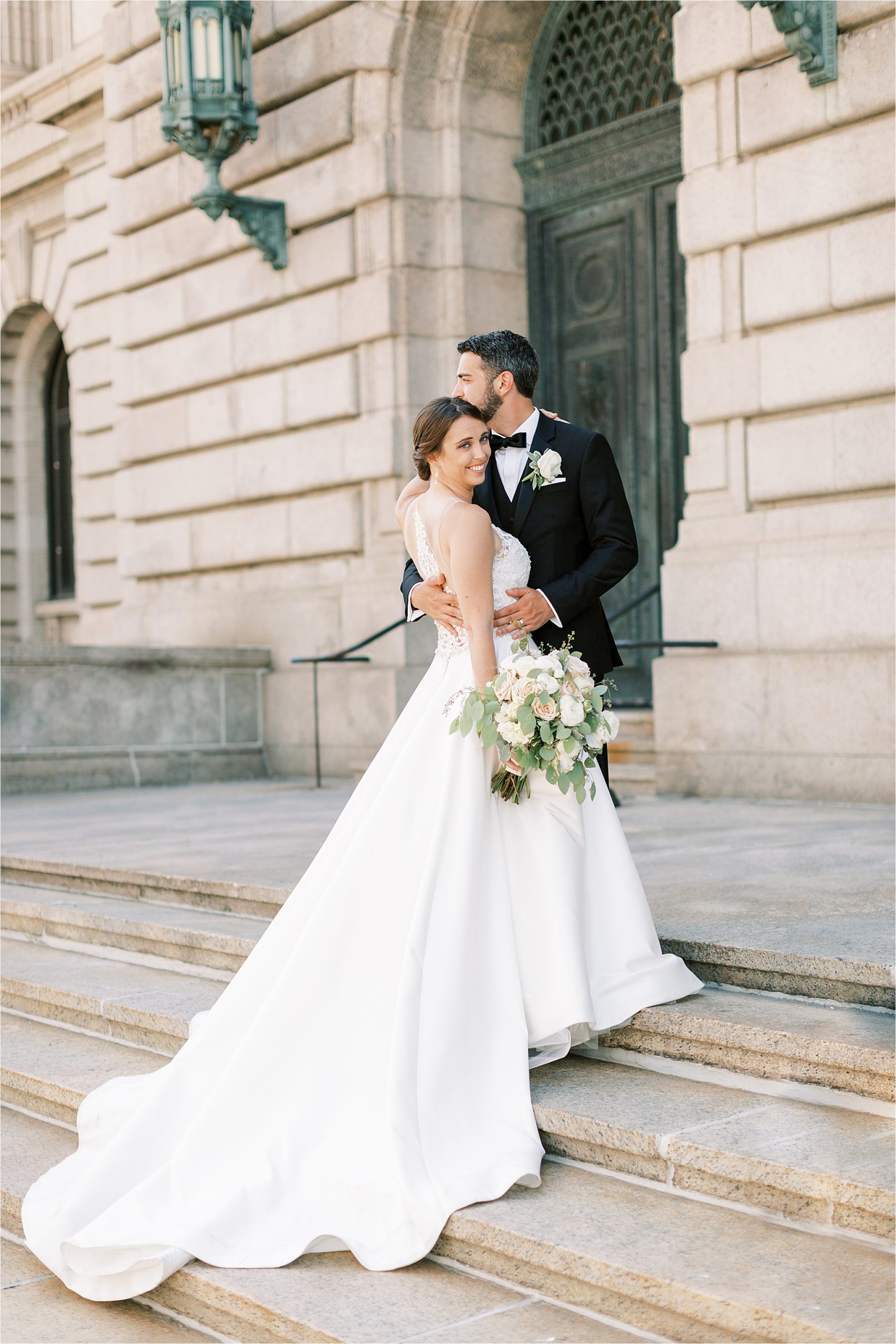 Bride and Groom outside of Cleveland Old Courthouse at their wedding